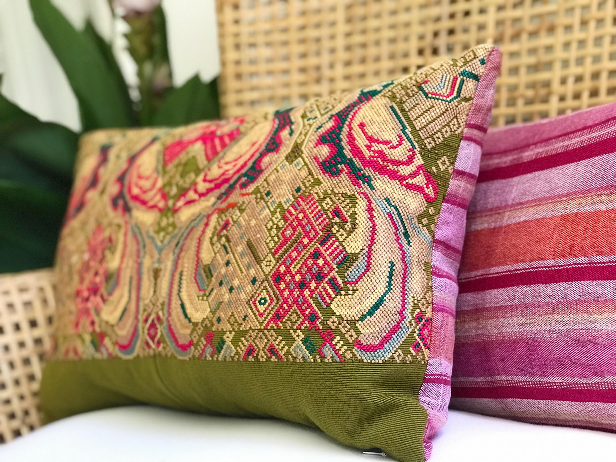 Vintage textile pillows made from a Guatemalan huipil and corte.