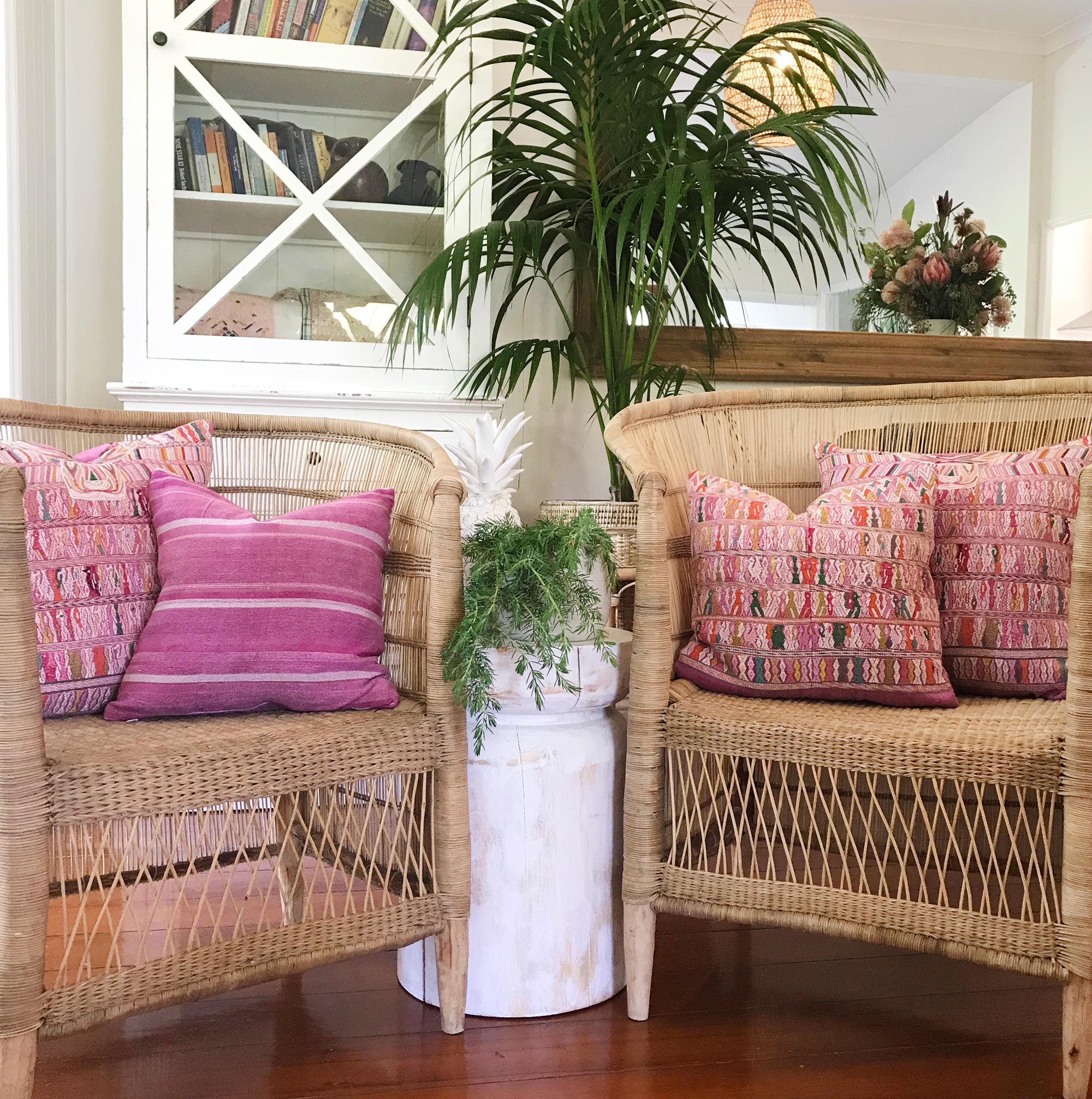 Vintage textile cushions made from a Guatemalan huipil and corte.