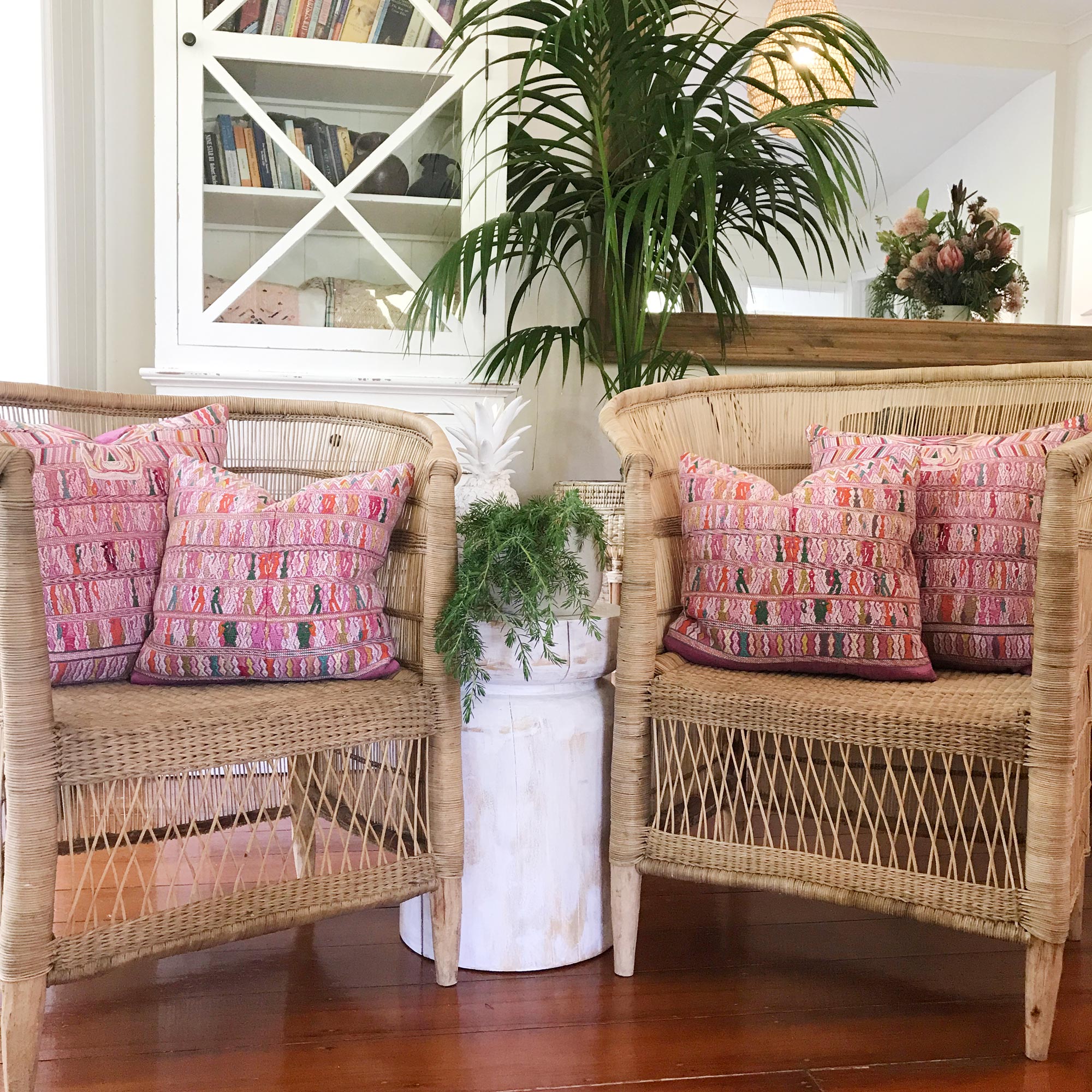 Vintage textile cushions made from a Guatemalan huipil and corte.