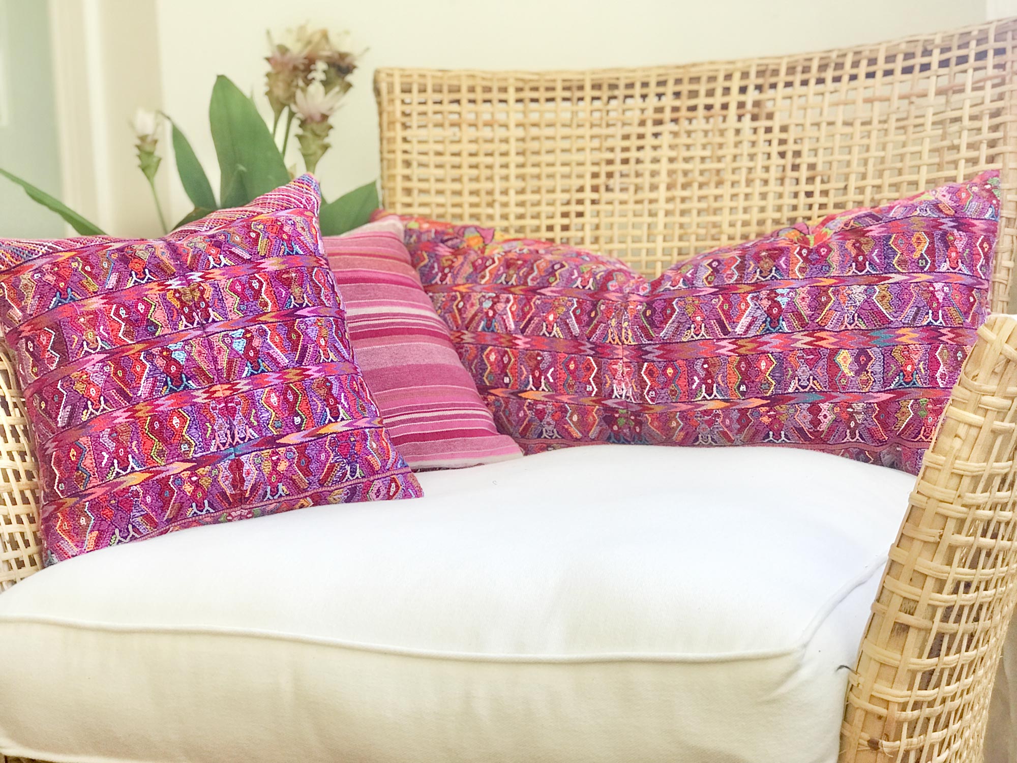 Vintage textile pillows made from a Guatemalan huipil and corte.