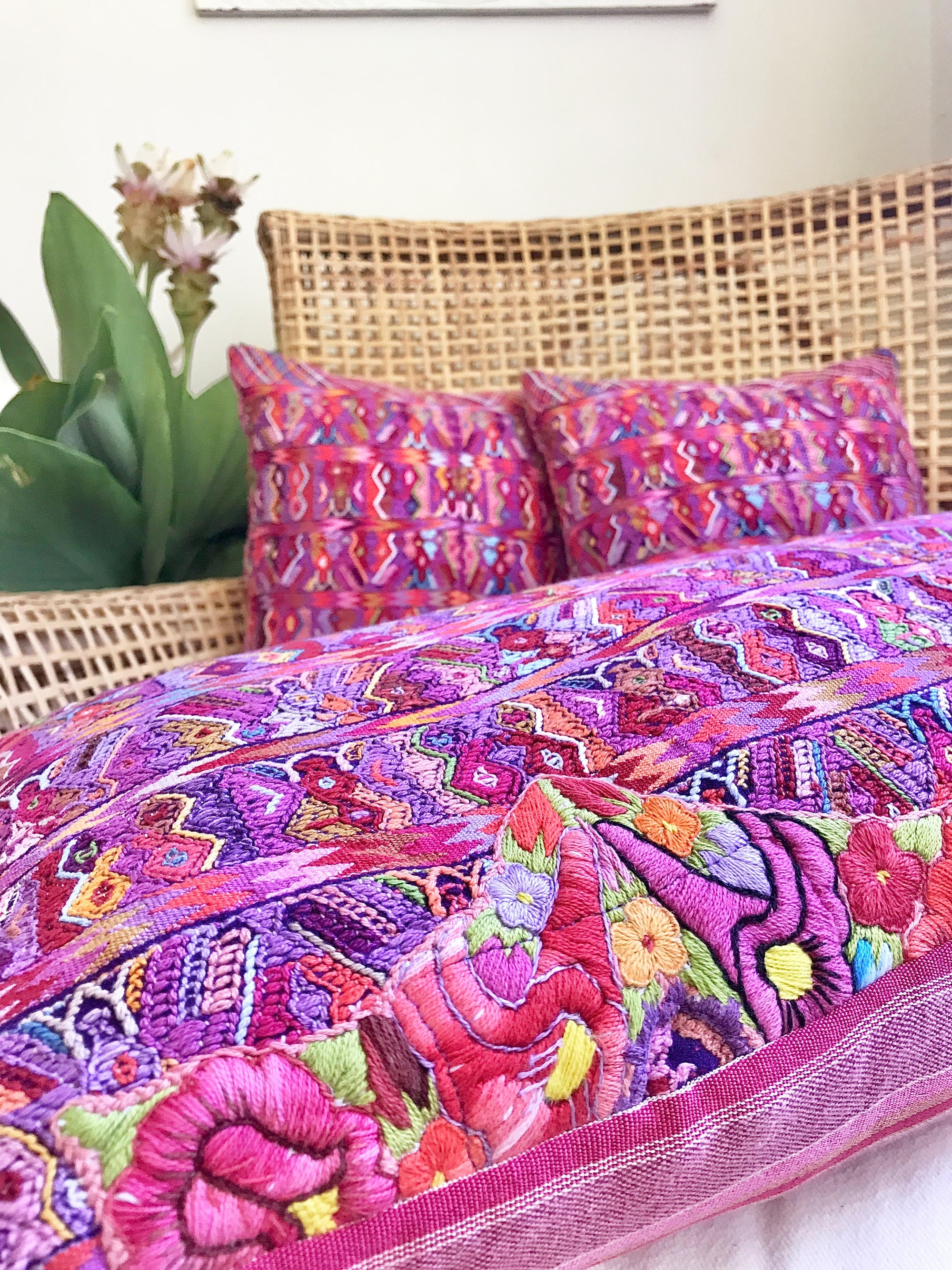 Vintage textile pillows made from a Guatemalan huipil and corte.