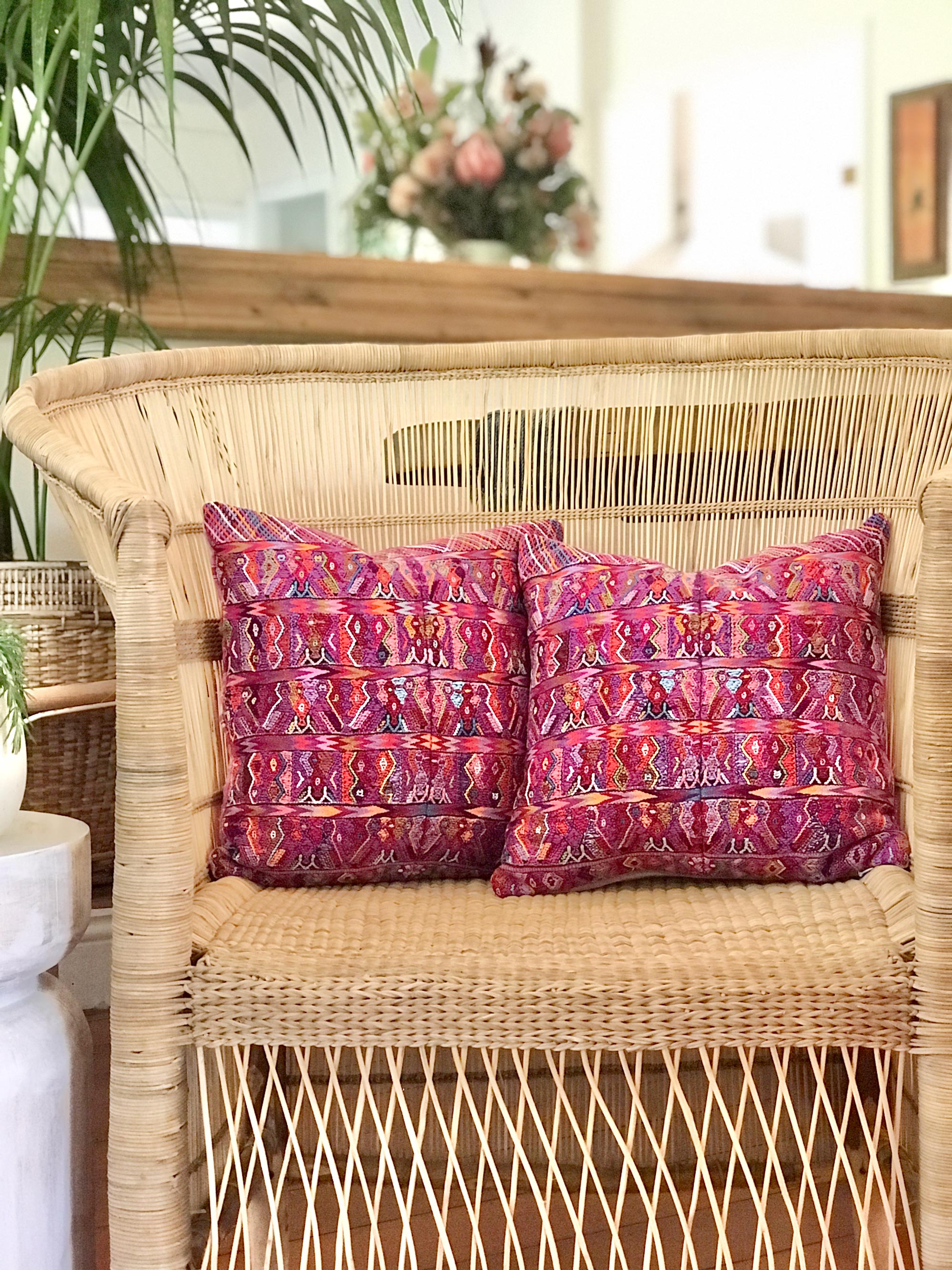 Vintage textile pillows made from a Guatemalan huipil and corte.