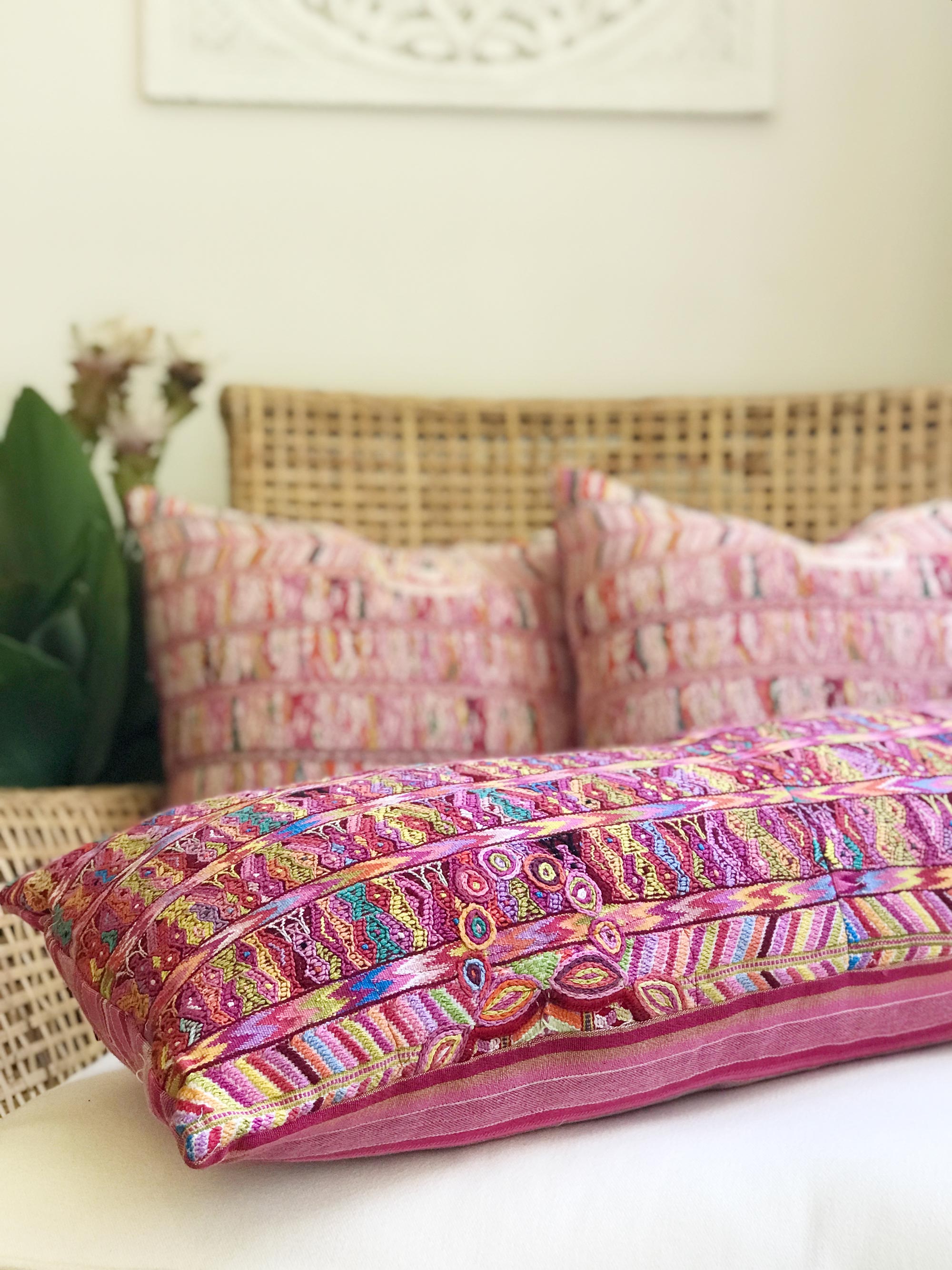 Vintage textile pillows made from a Guatemalan huipil and corte.