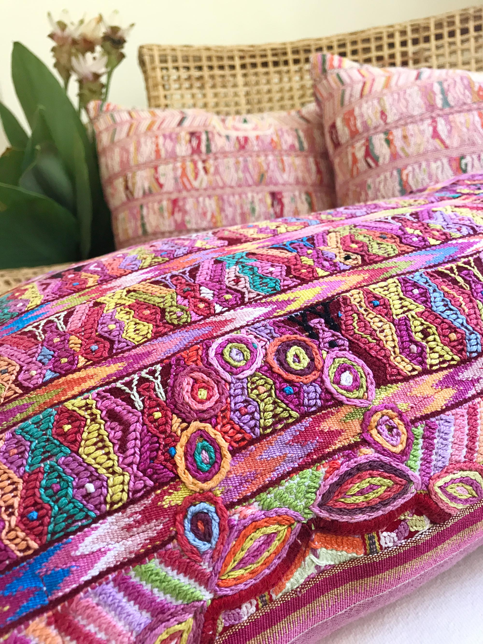 Vintage textile pillows made from a Guatemalan huipil and corte.
