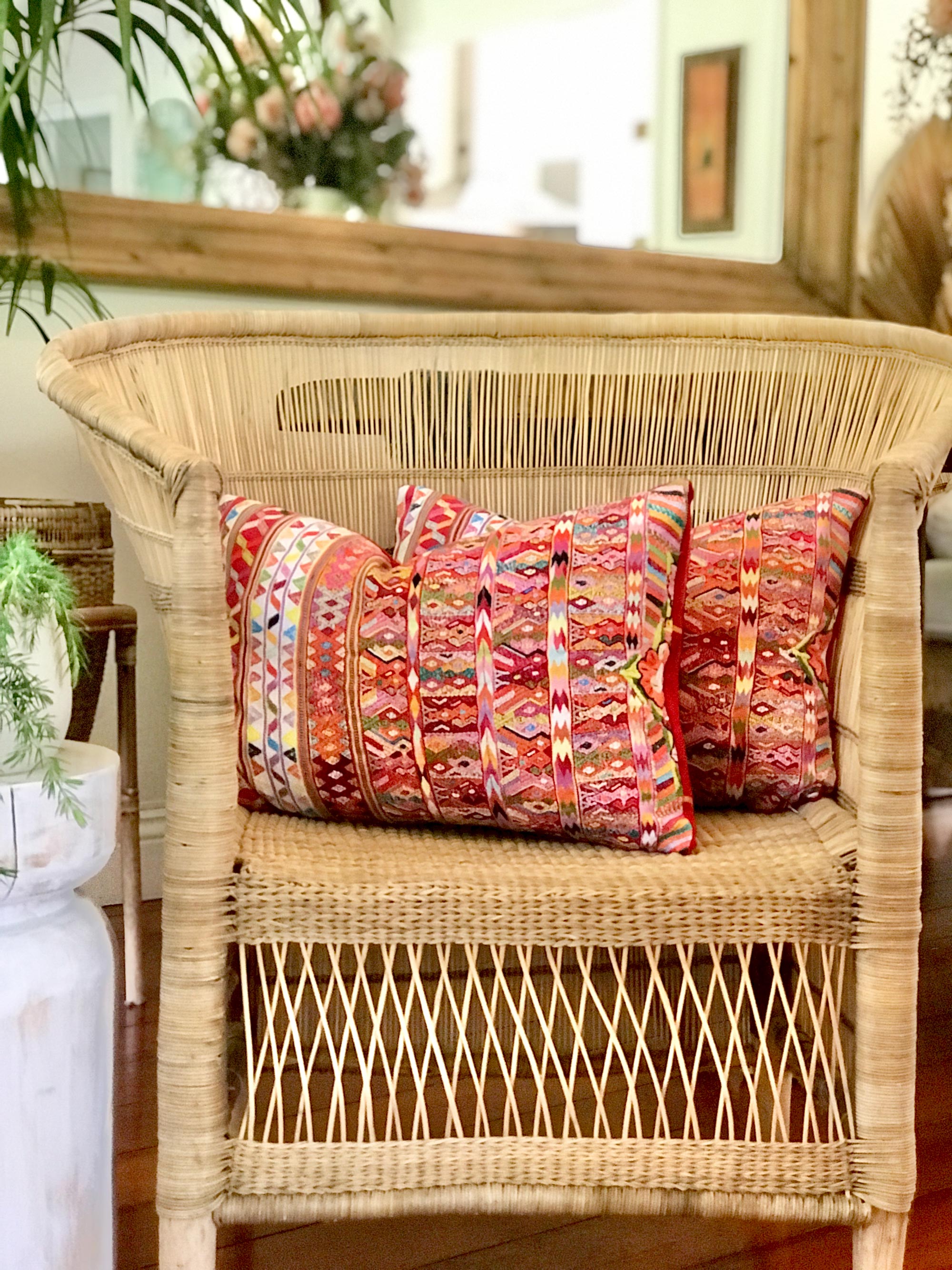 Vintage textile cushions made from a Guatemalan huipil and corte.