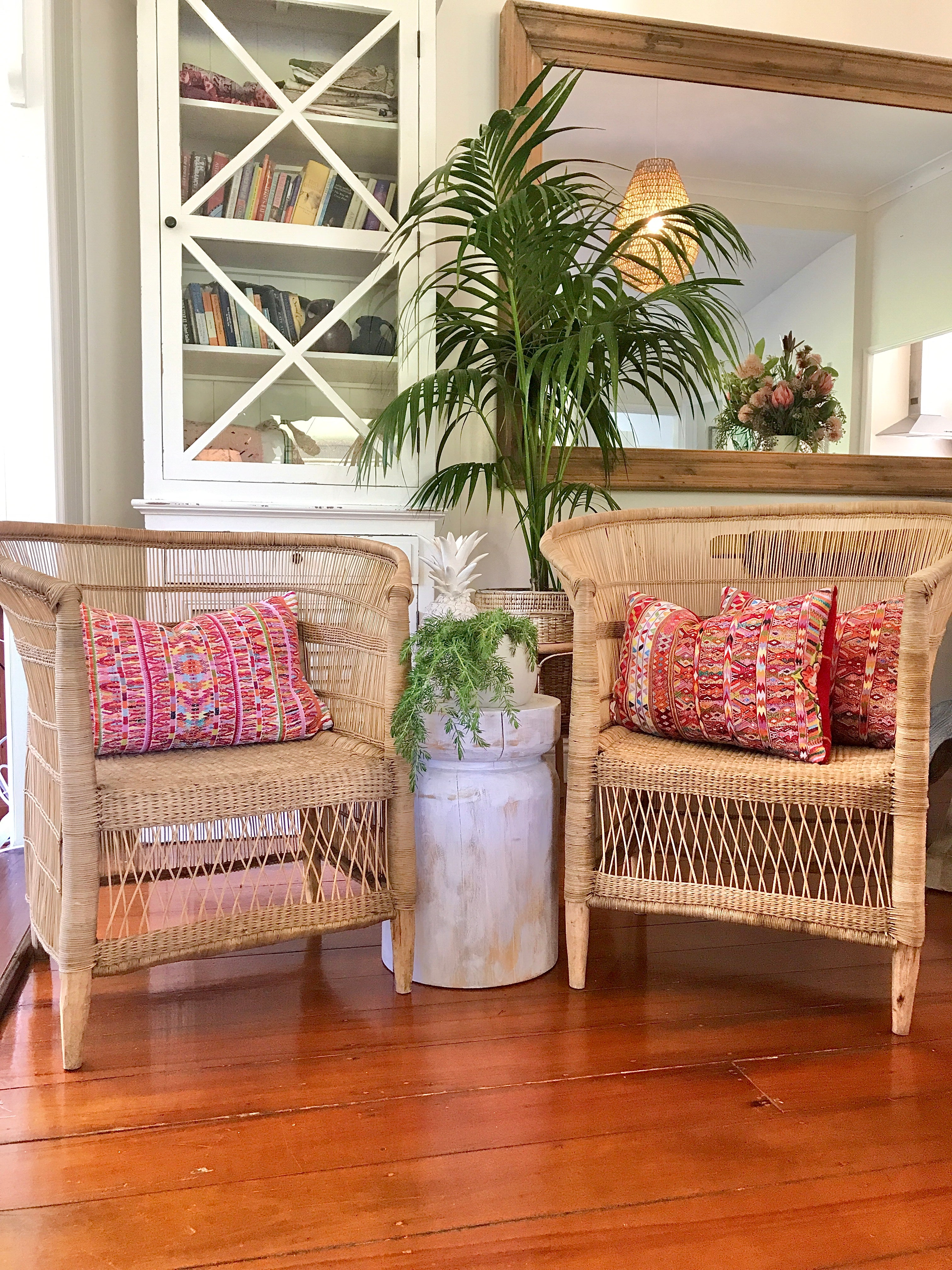 Vintage textile cushions made from a Guatemalan huipil and corte.