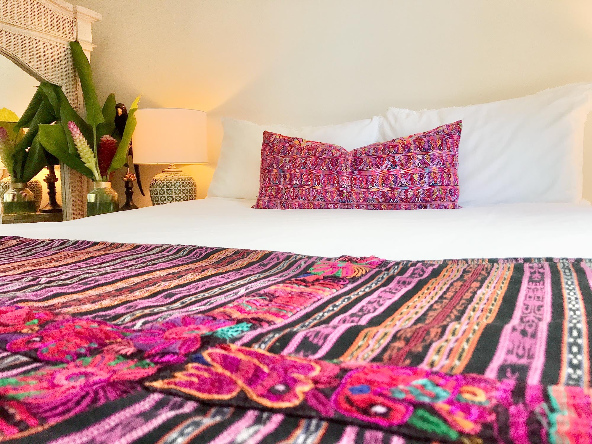 Vintage textile pillows made from a Guatemalan huipil and corte.