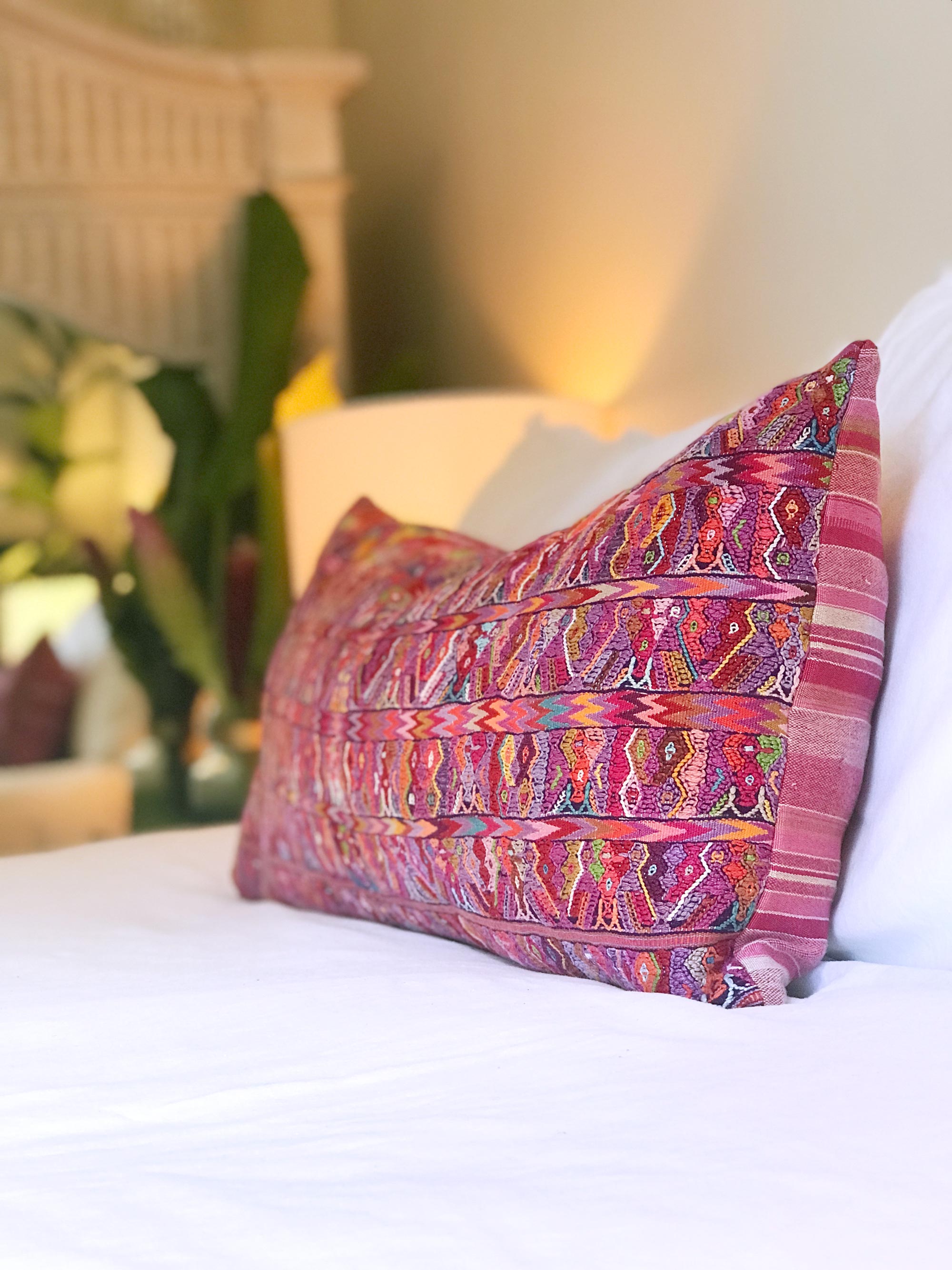 Vintage textile pillows made from a Guatemalan huipil and corte.