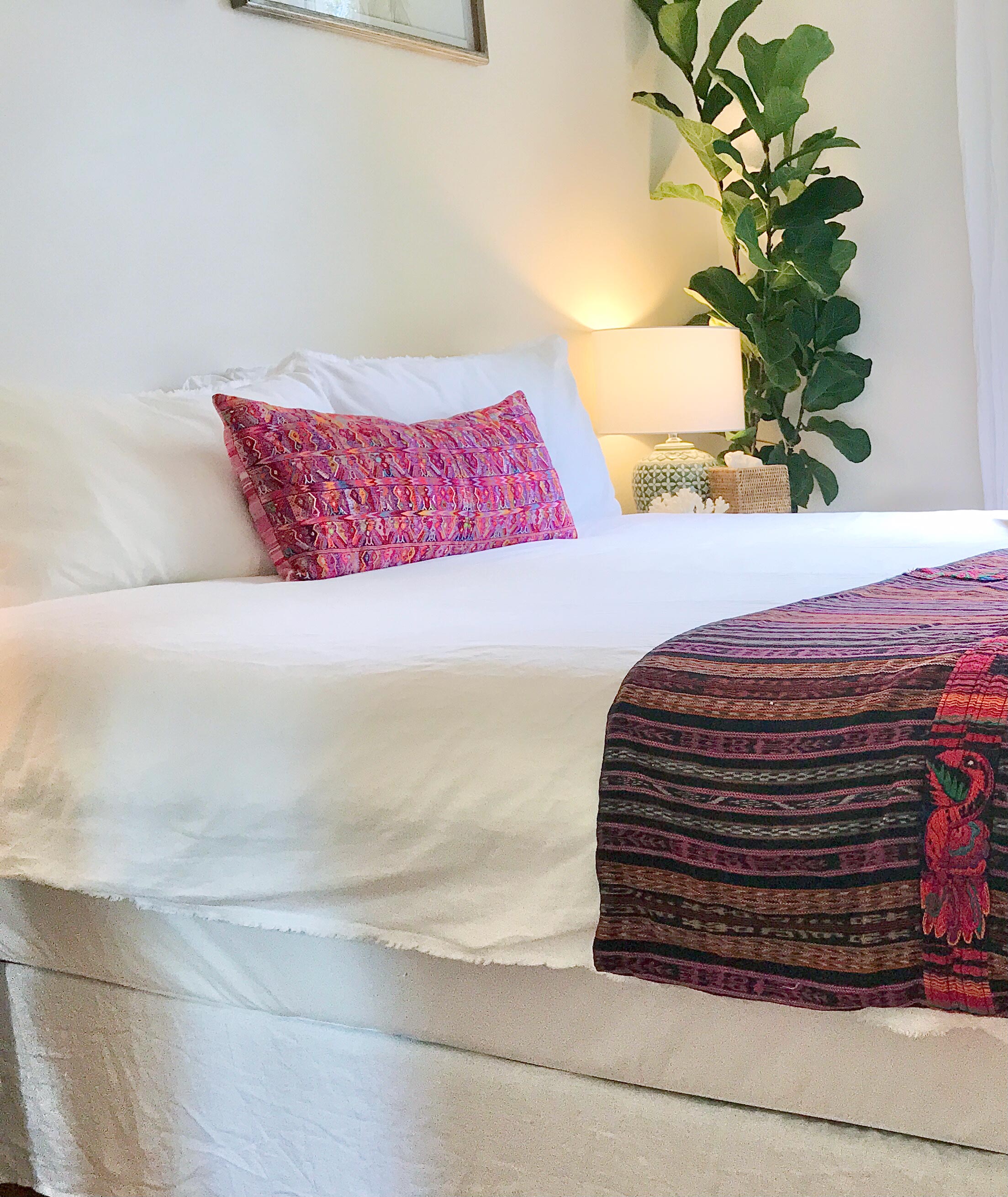 Vintage textile pillows made from a Guatemalan huipil and corte.