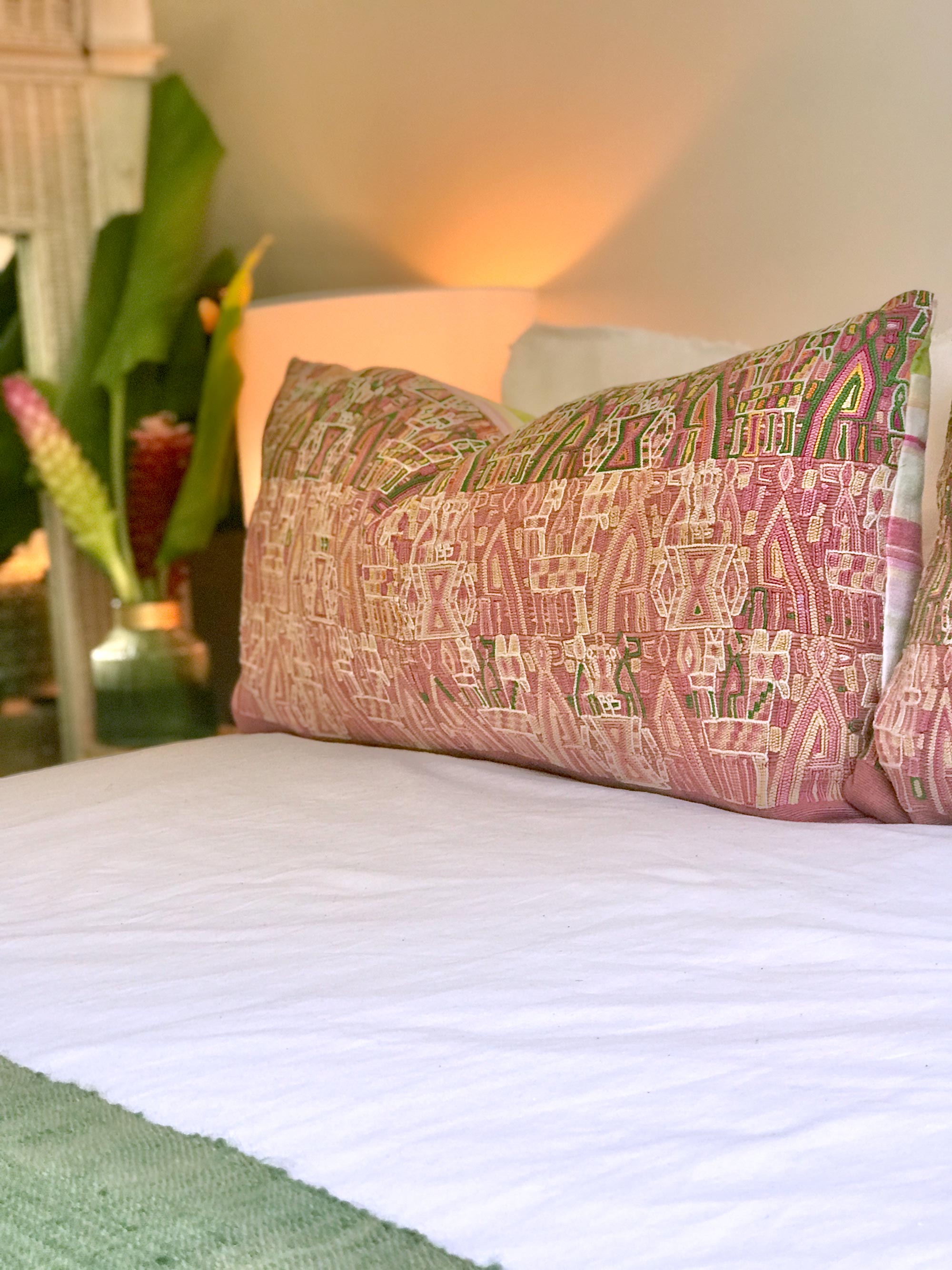 Vintage textile pillows made from a Guatemalan huipil and corte.