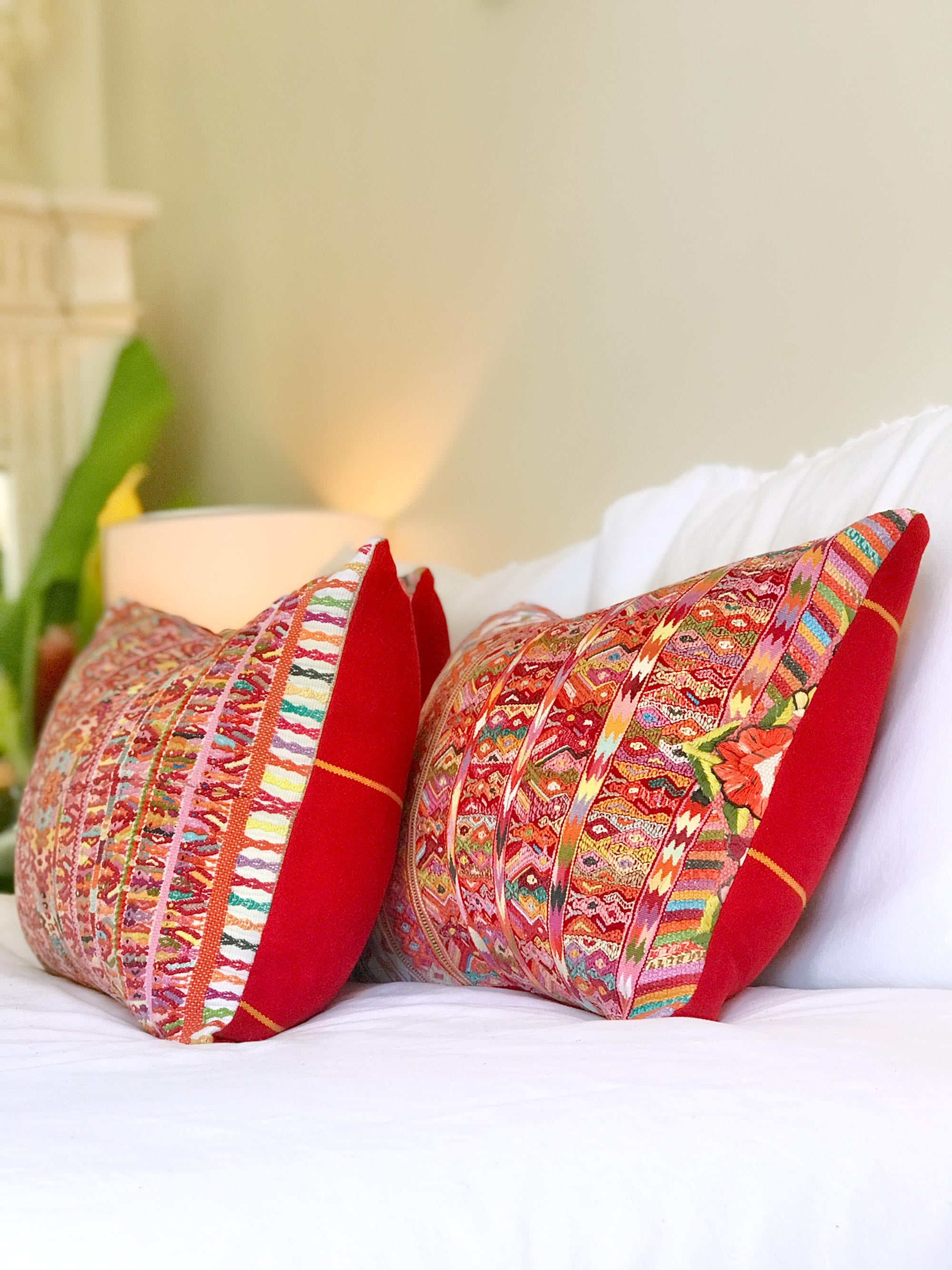 Vintage textile cushions made from a Guatemalan huipil and corte.