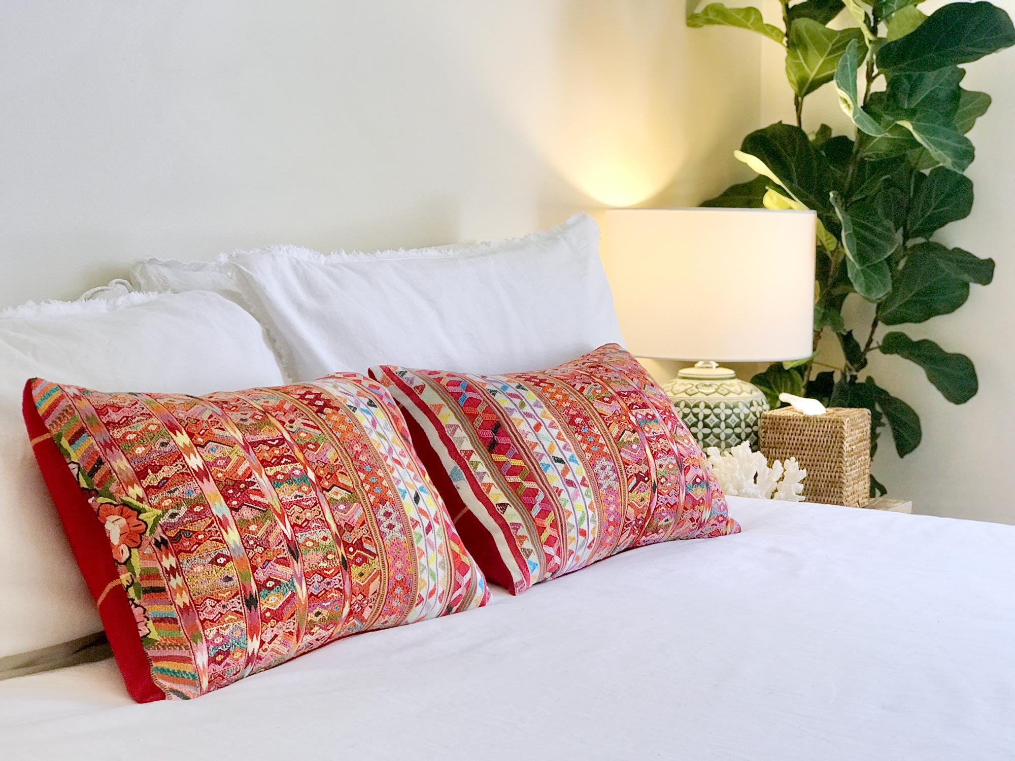 Vintage textile cushions made from a Guatemalan huipil and corte.