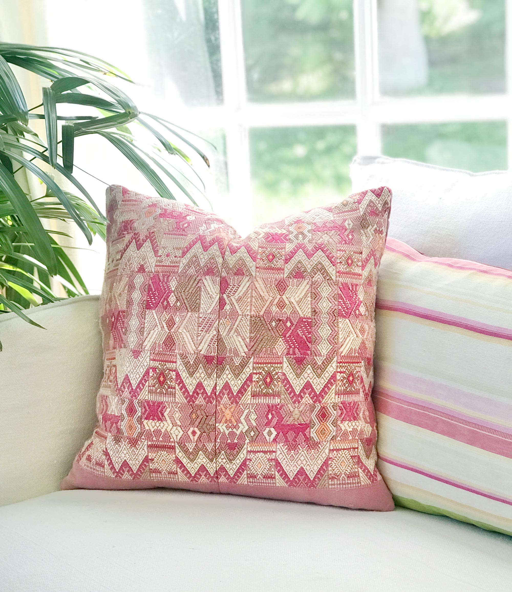 Vintage textile cushions made from a Guatemalan huipil and corte.