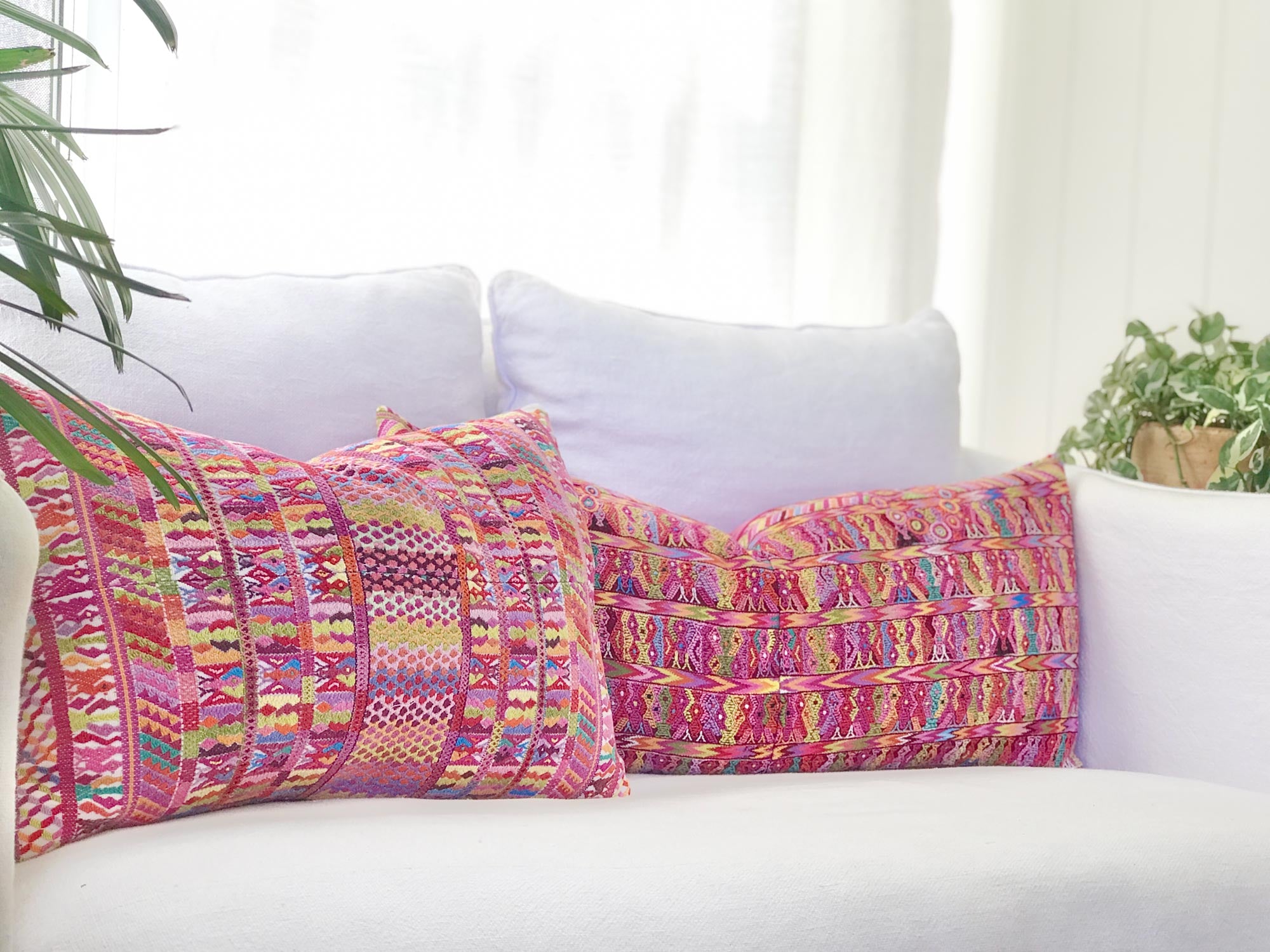 Vintage textile pillows made from a Guatemalan huipil and corte.