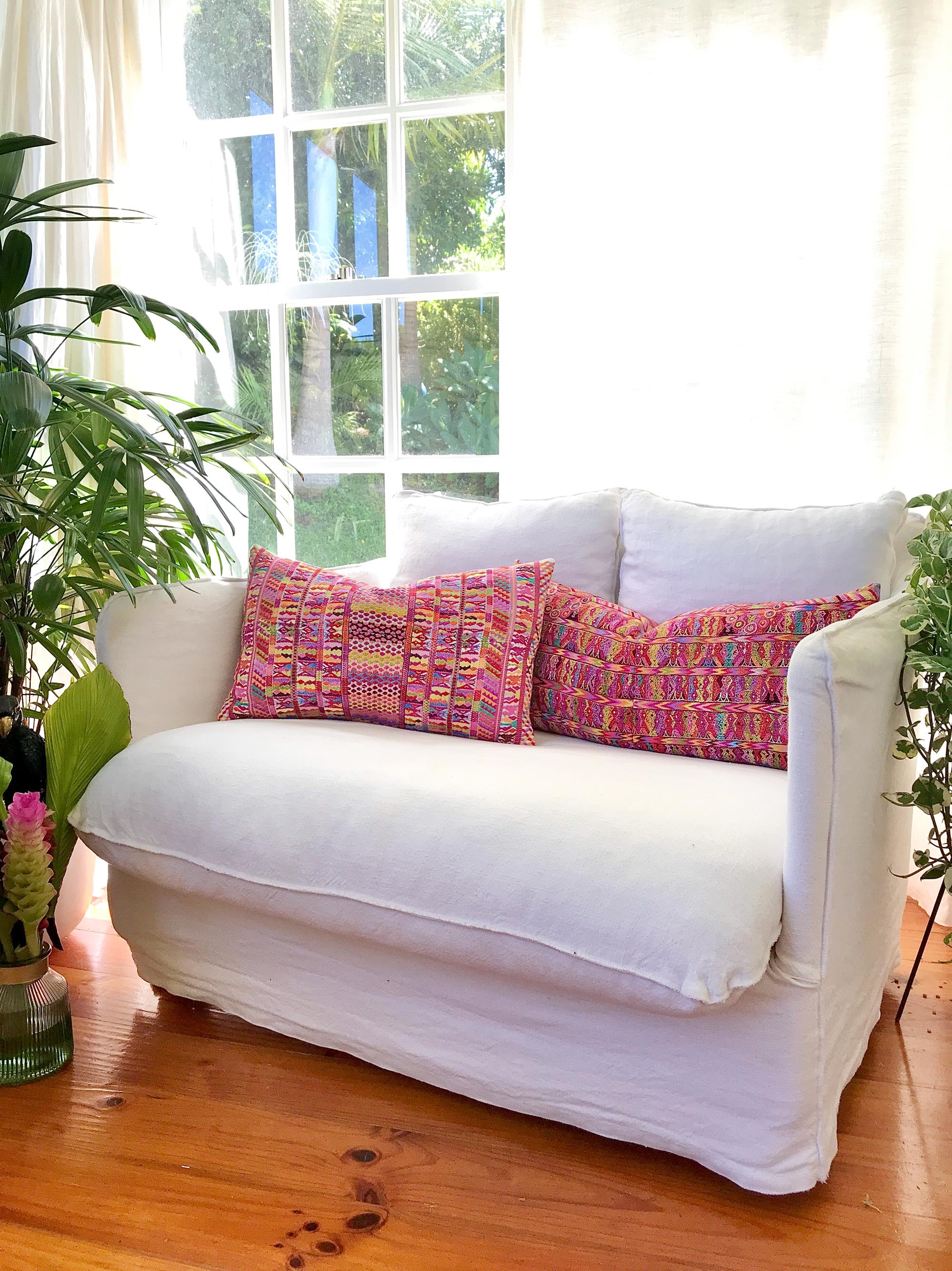 Vintage textile pillows made from a Guatemalan huipil and corte.