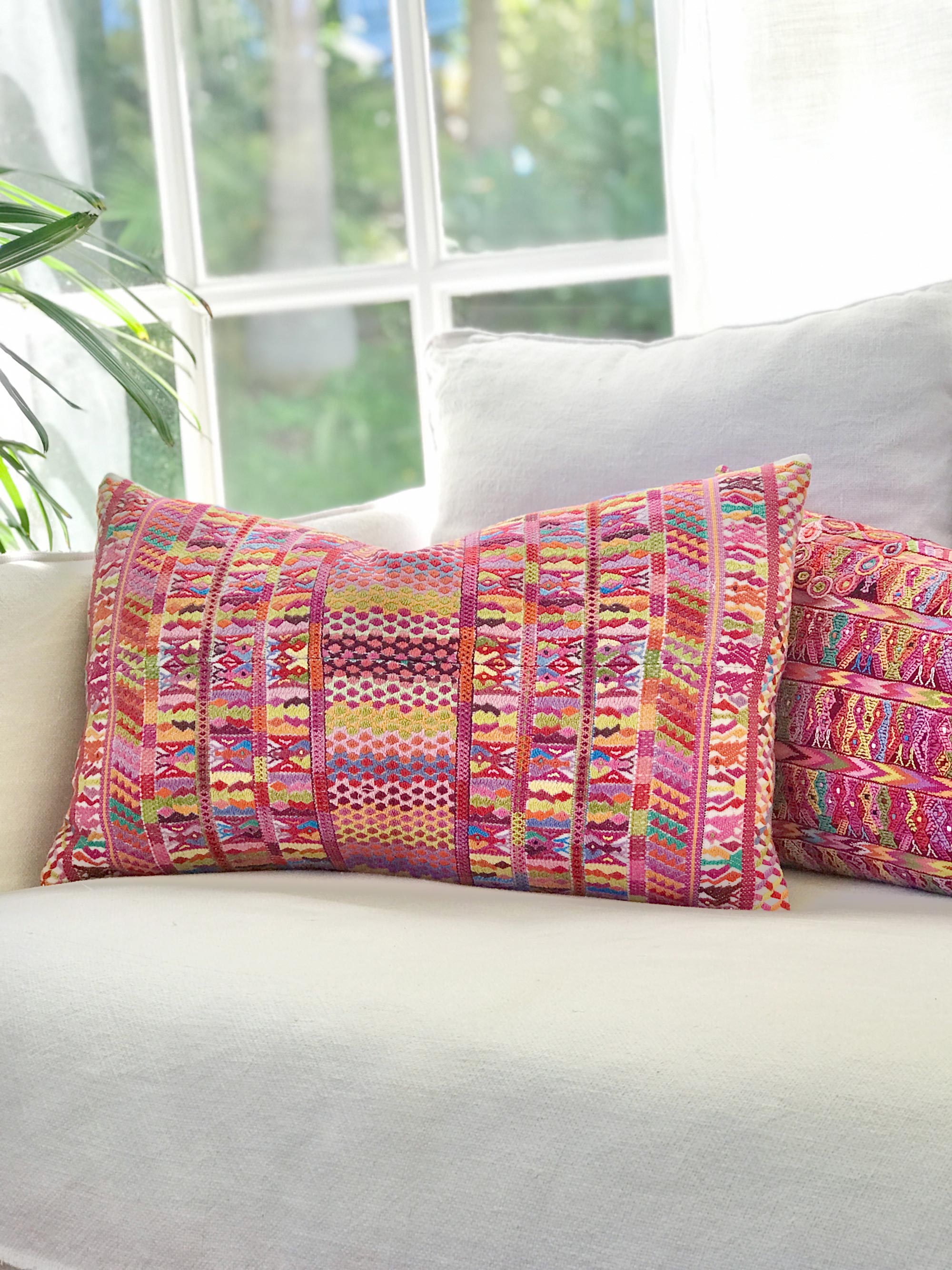 Vintage textile pillows made from a Guatemalan huipil and corte.