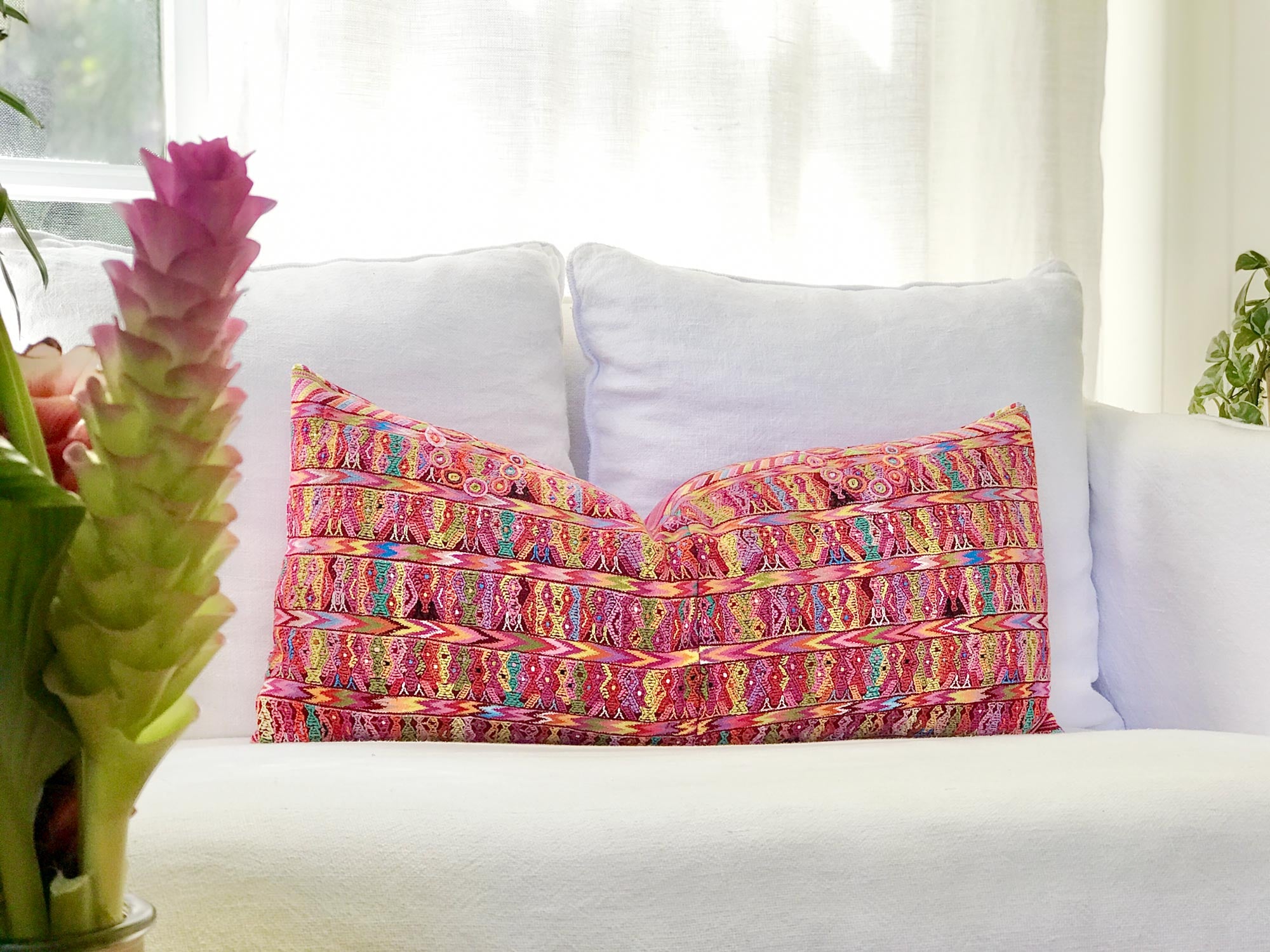 Vintage textile pillows made from a Guatemalan huipil and corte.