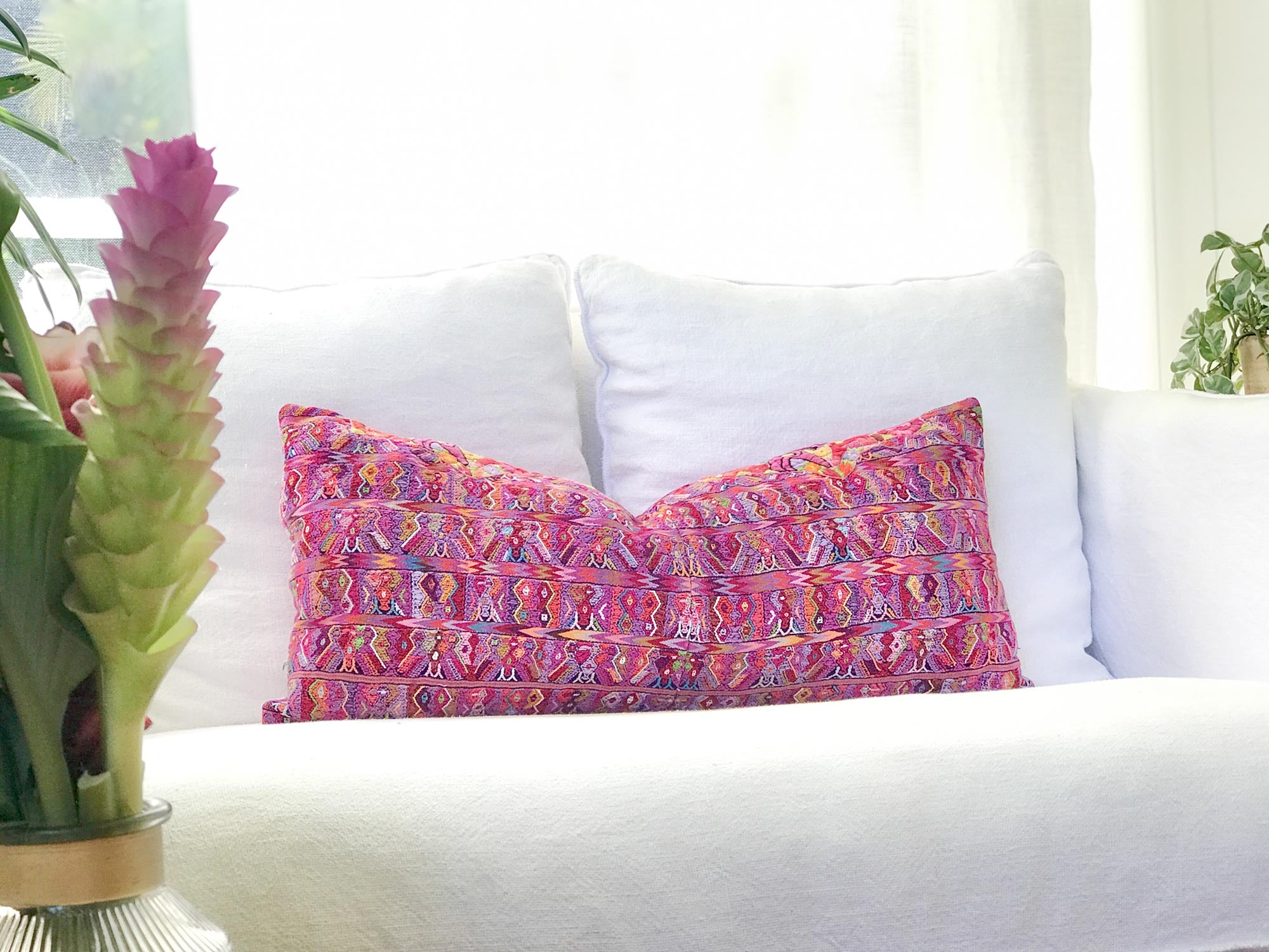 Vintage textile pillows made from a Guatemalan huipil and corte.