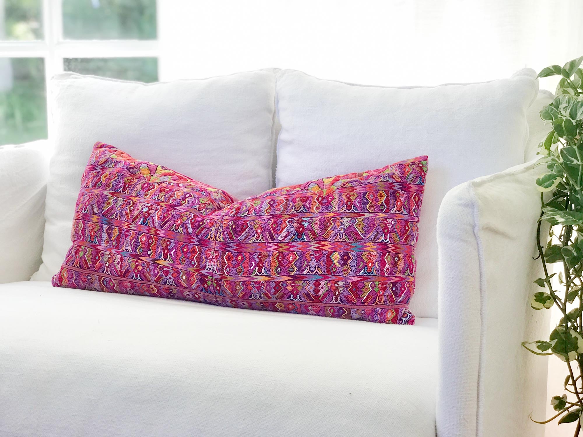 Vintage textile pillows made from a Guatemalan huipil and corte.