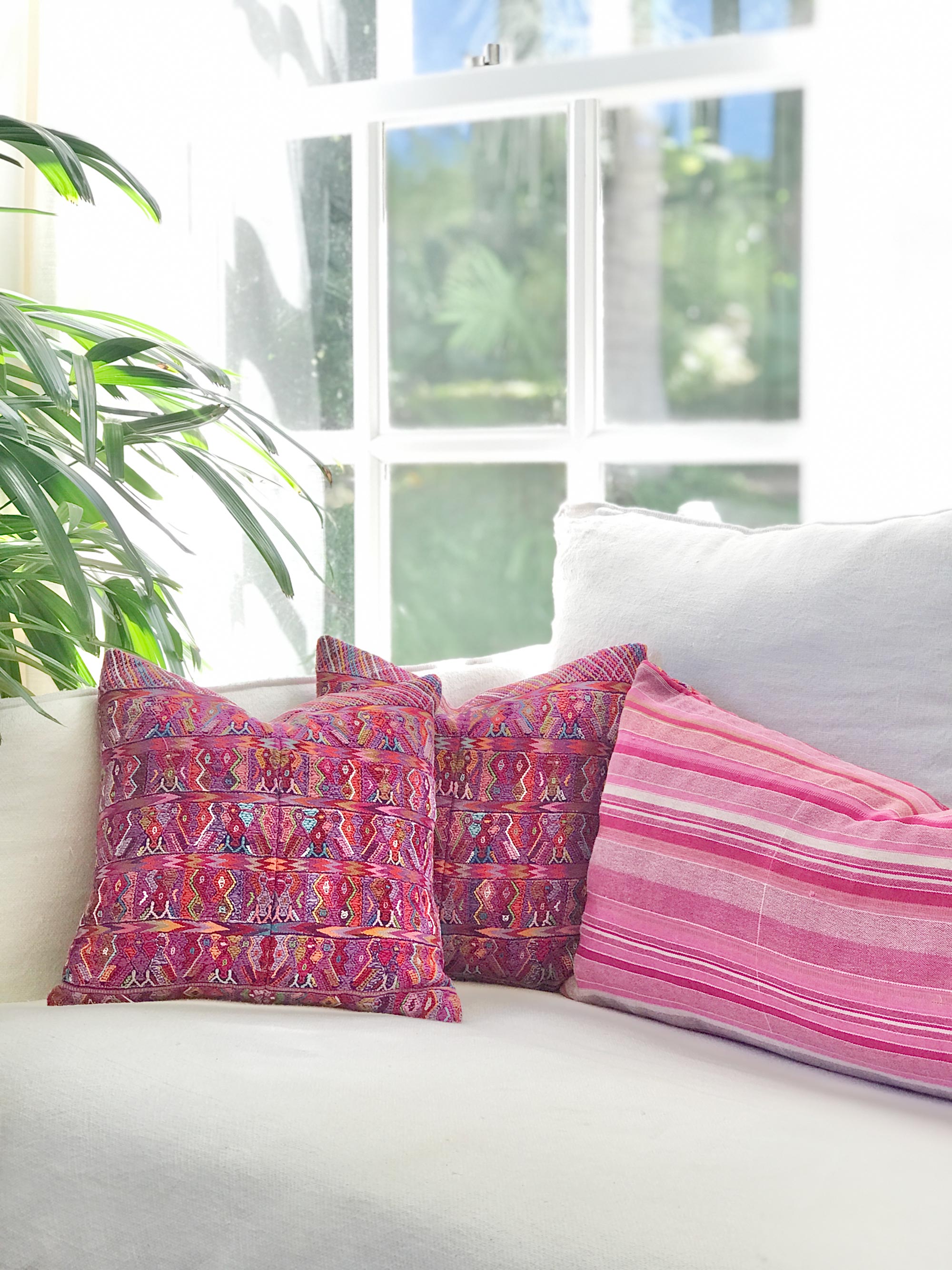 Vintage textile pillows made from a Guatemalan huipil and corte.