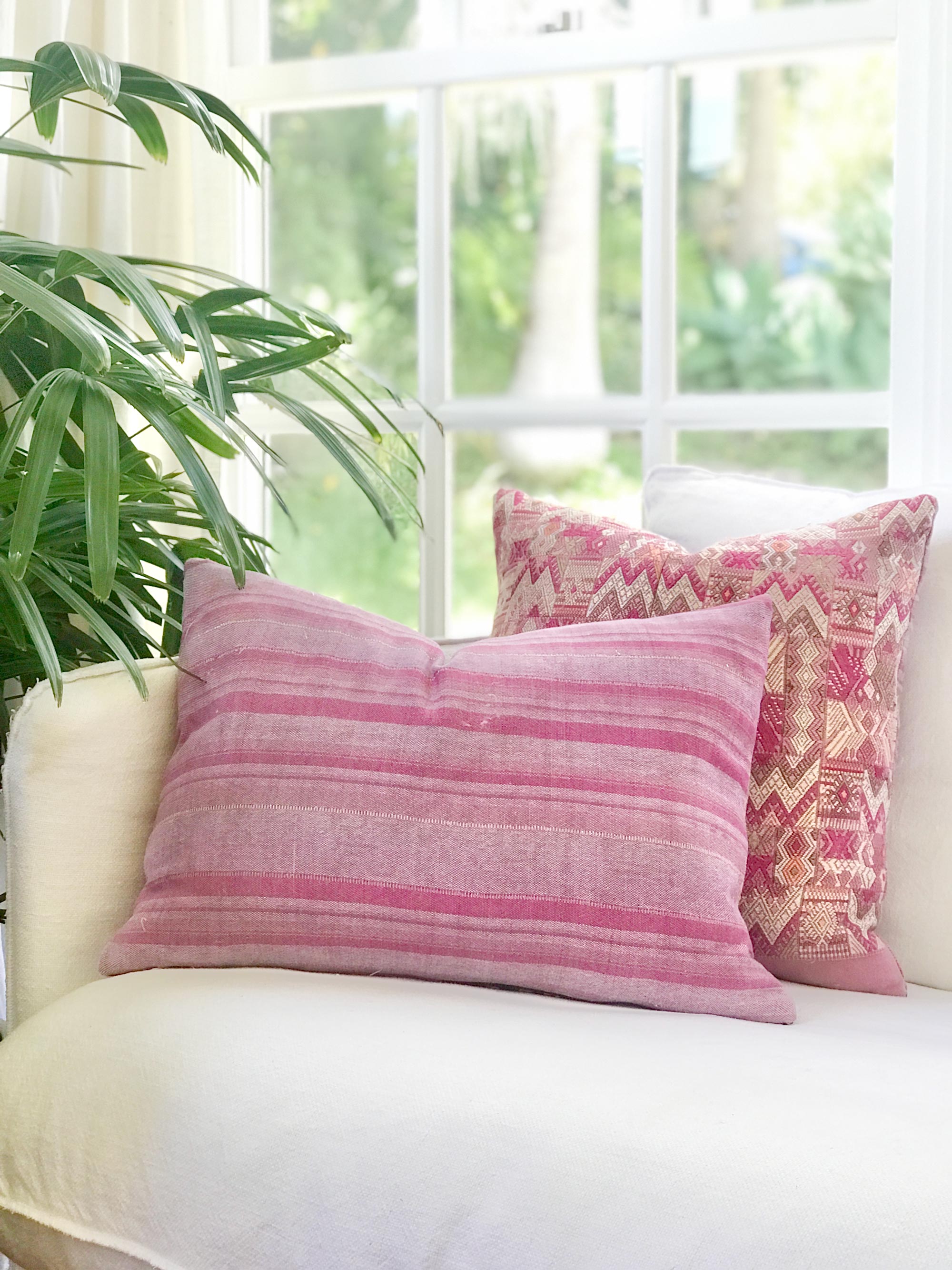Vintage textile cushions made from a Guatemalan huipil and corte.
