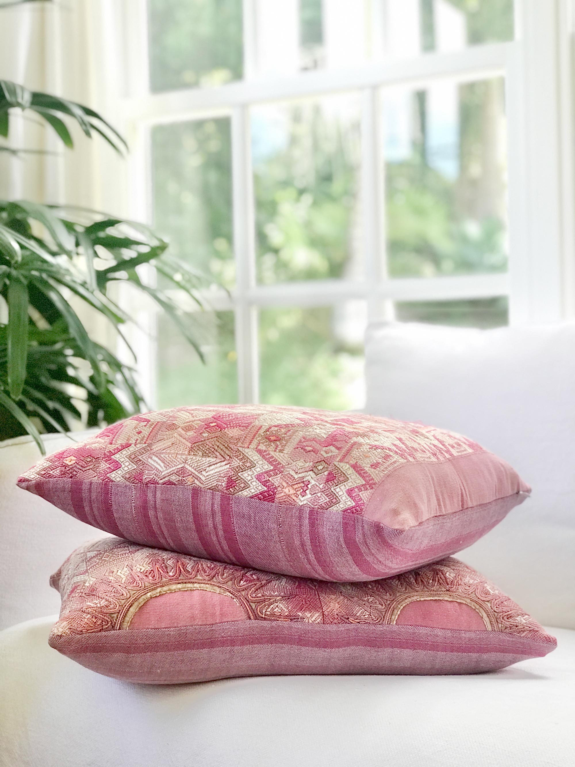 Vintage textile cushions made from a Guatemalan huipil and corte.