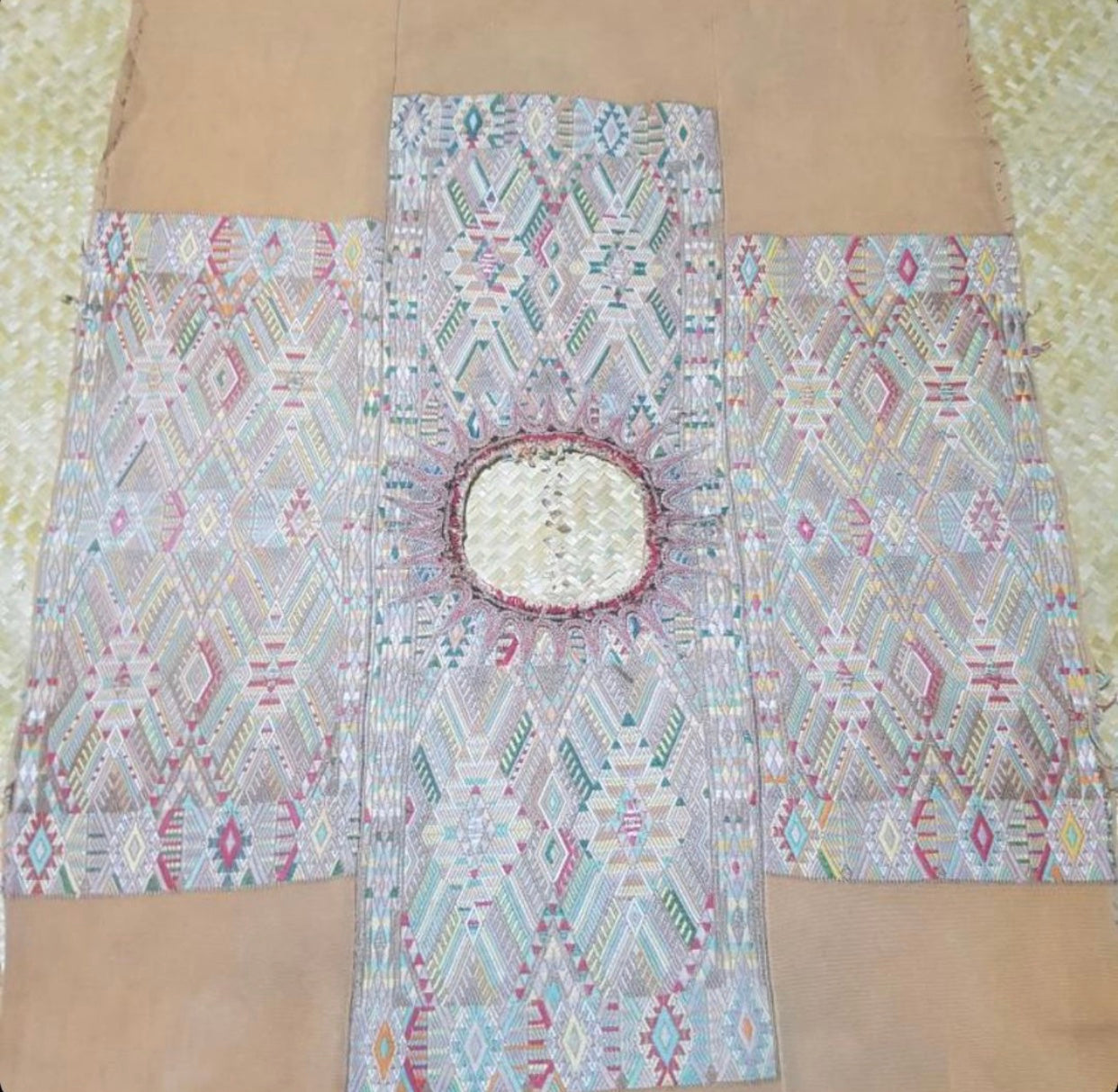 Guatemalan embroidered huipil pillow. Geometric chevron pattern in beige.