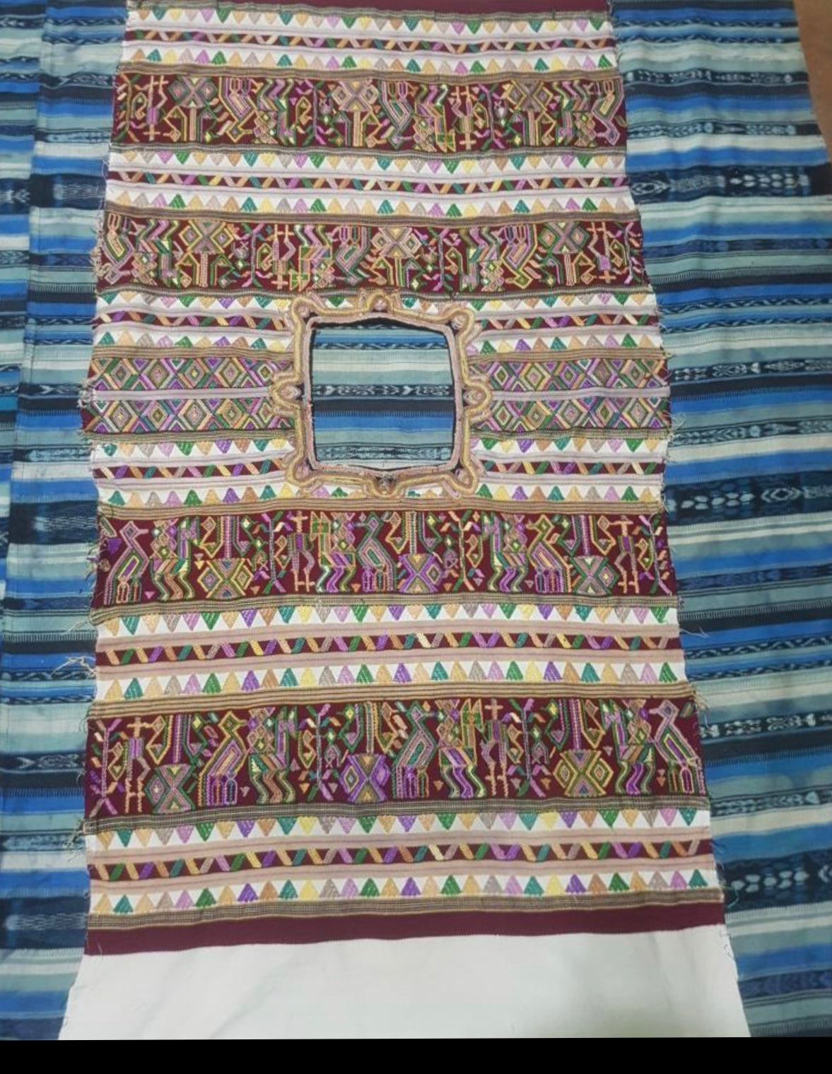 Guatemalan embroidered huipil pillow. Hieroglyphic figures in rows create a strong tribal vibe.