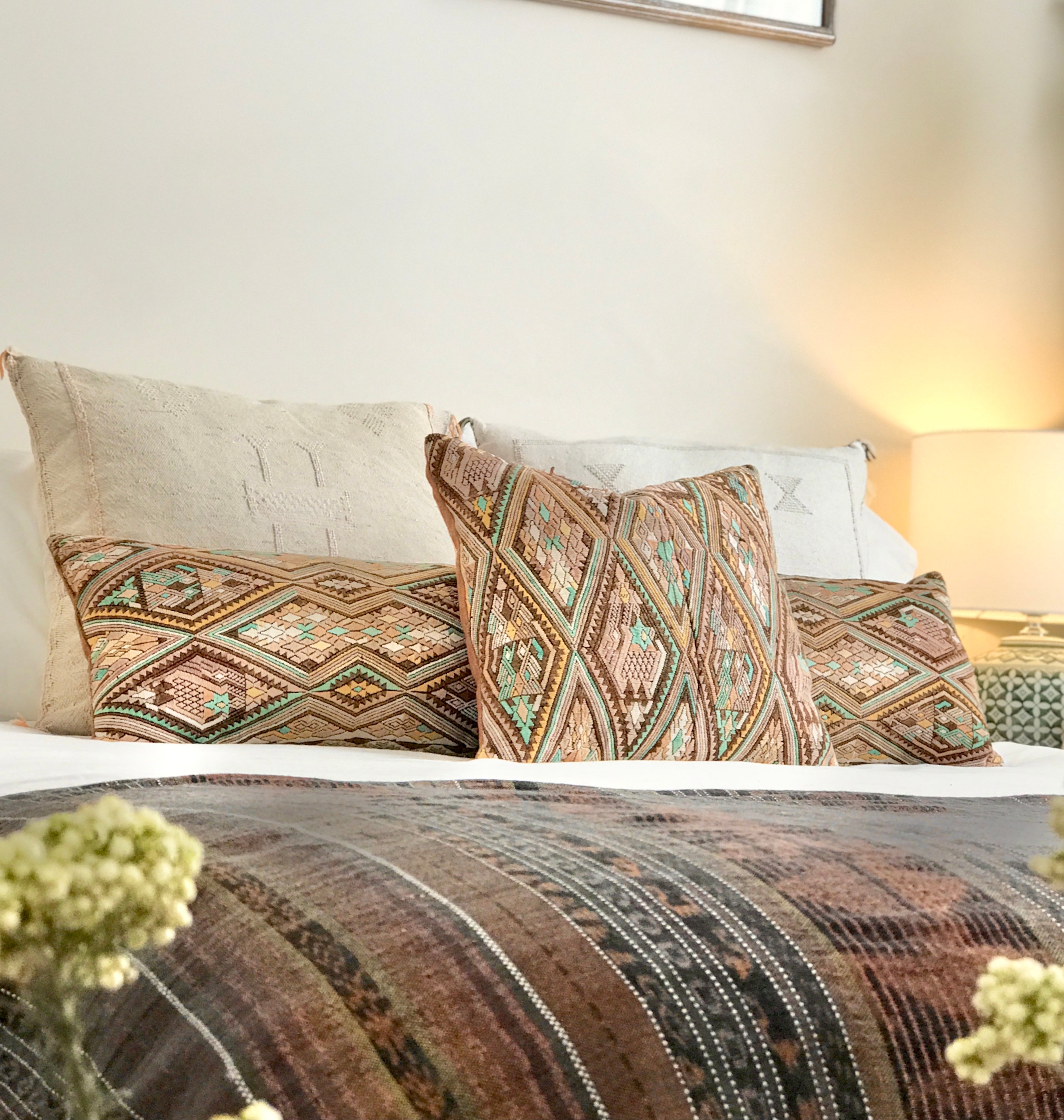 Embroidered Guatemalan huipil textile repurposed into a pillow