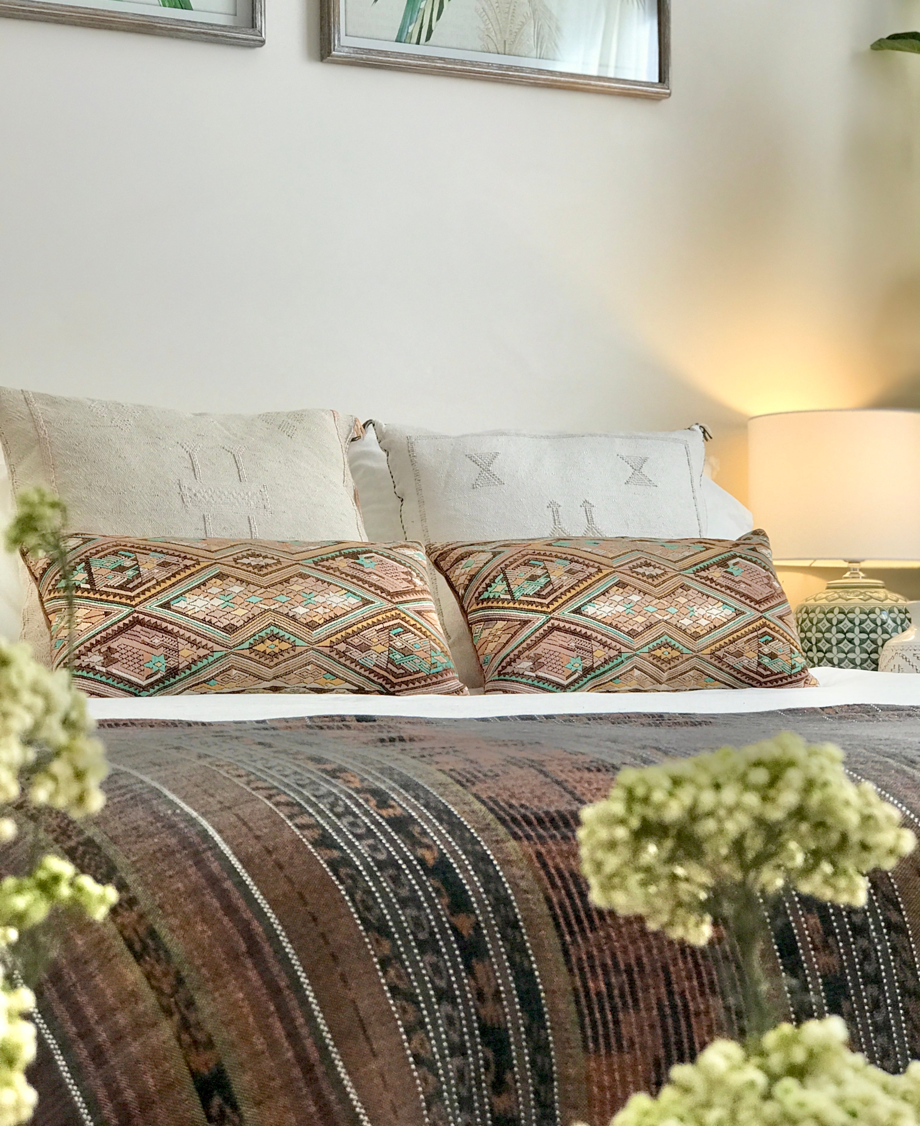 Guatemalan embroidered huipil pillow. Geometric chevron design in bold fuchsia