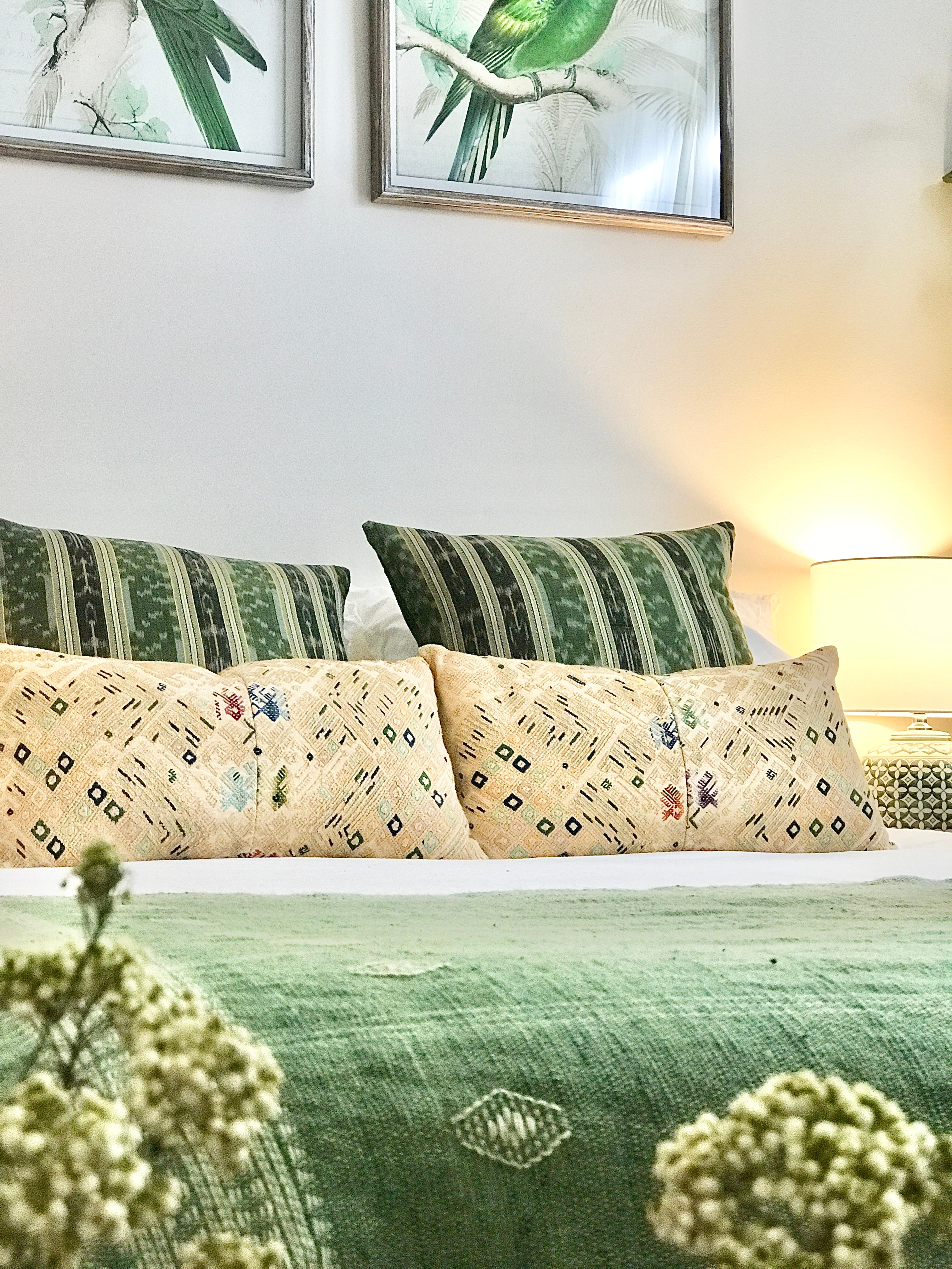 Guatemalan embroidered huipil pillow. Geometric chevron design in bold fuchsia