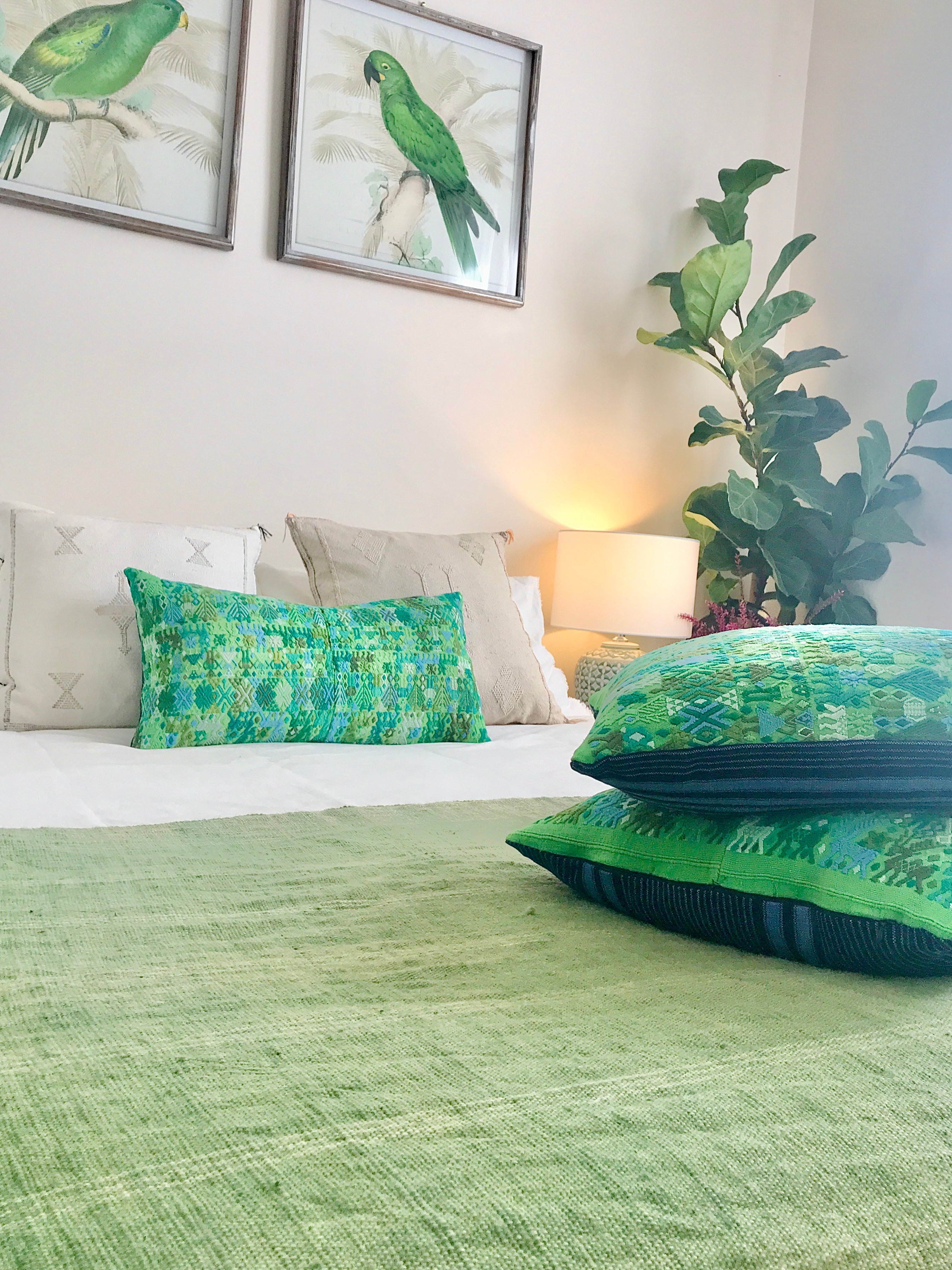 Vintage textile cushions made from a Guatemalan huipil and corte.