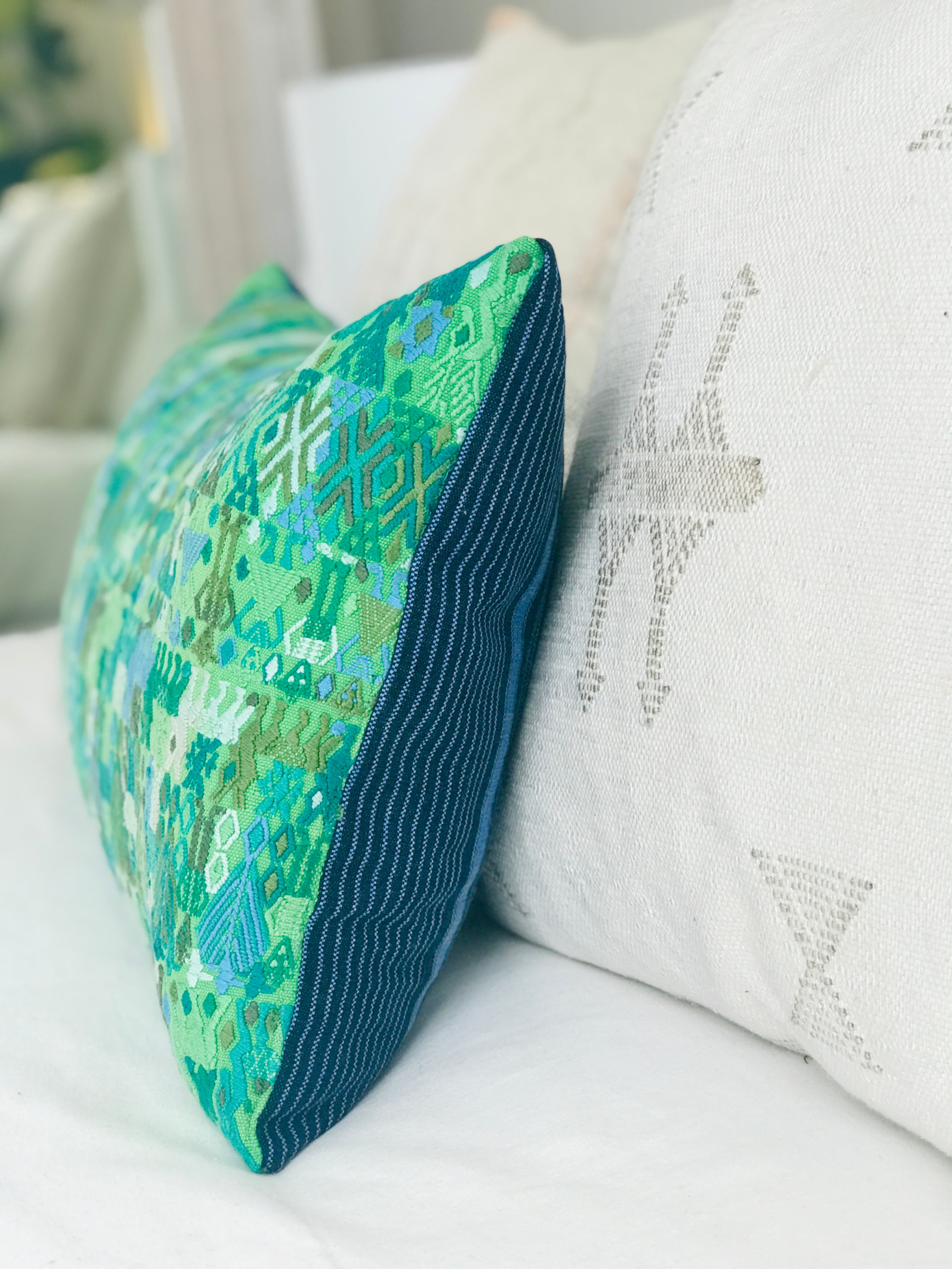 Vintage textile cushions made from a Guatemalan huipil and corte.