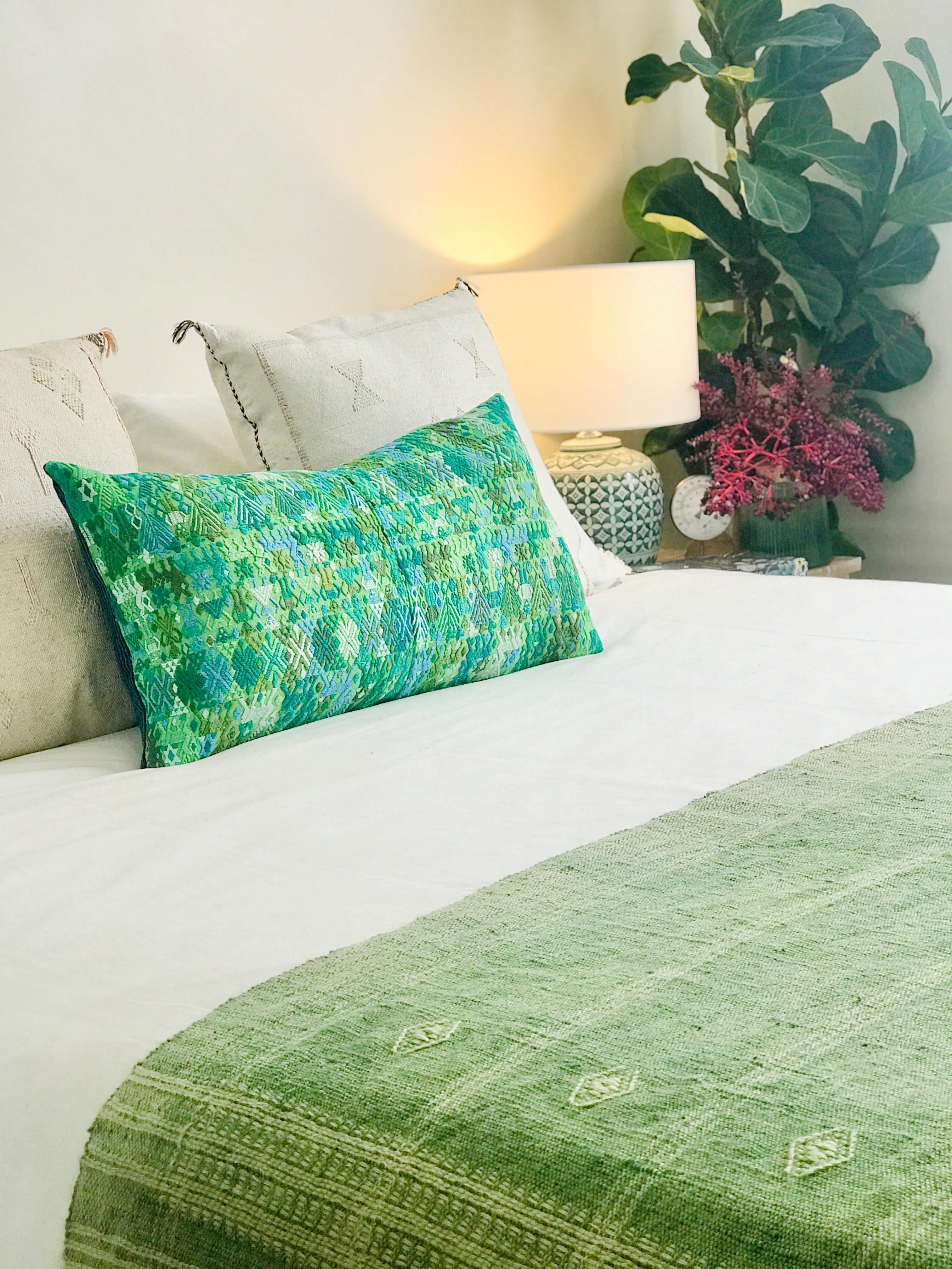 Vintage textile cushions made from a Guatemalan huipil and corte.