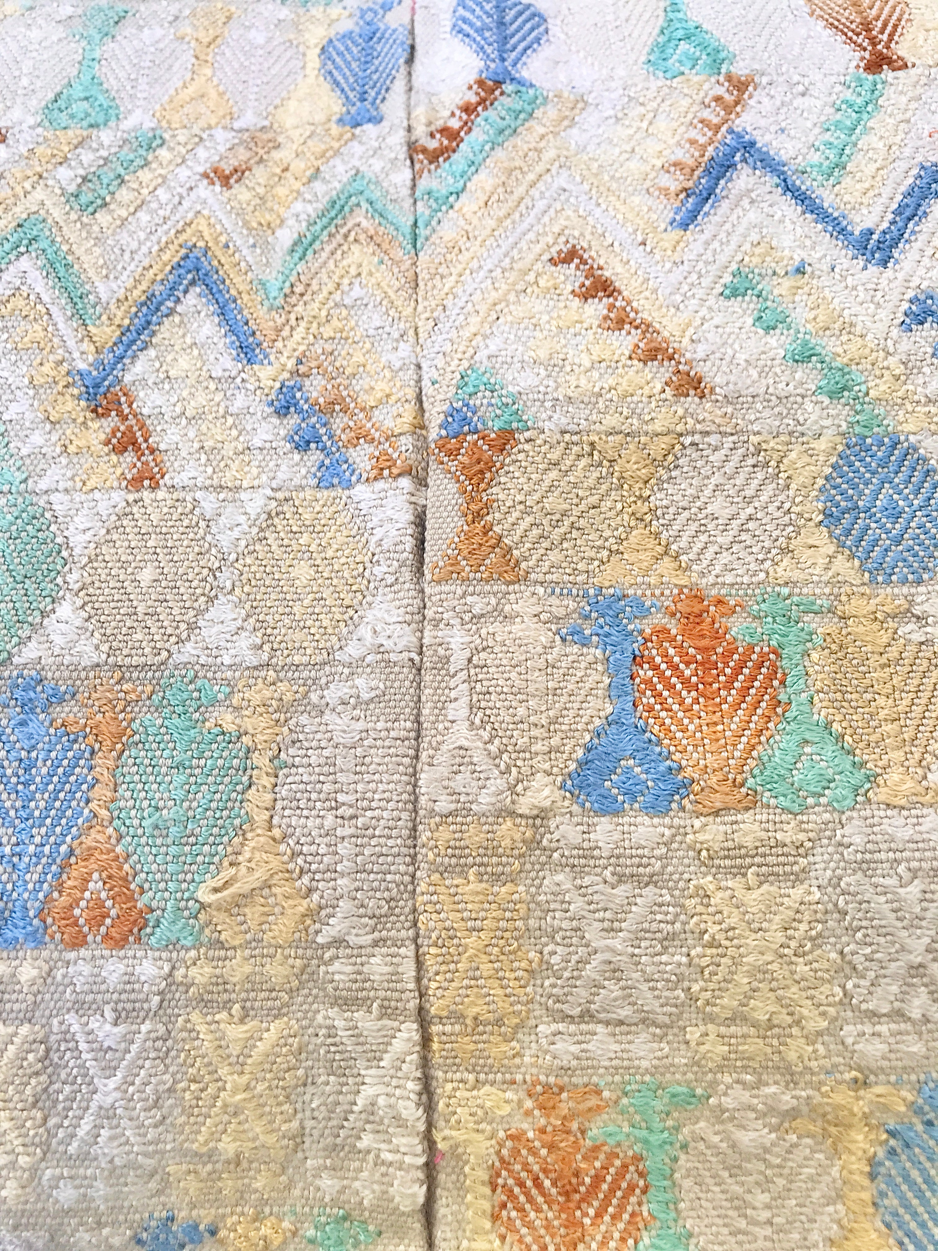 Guatemalan embroidered huipil pillow. Geometric chevron design in bold fuchsia