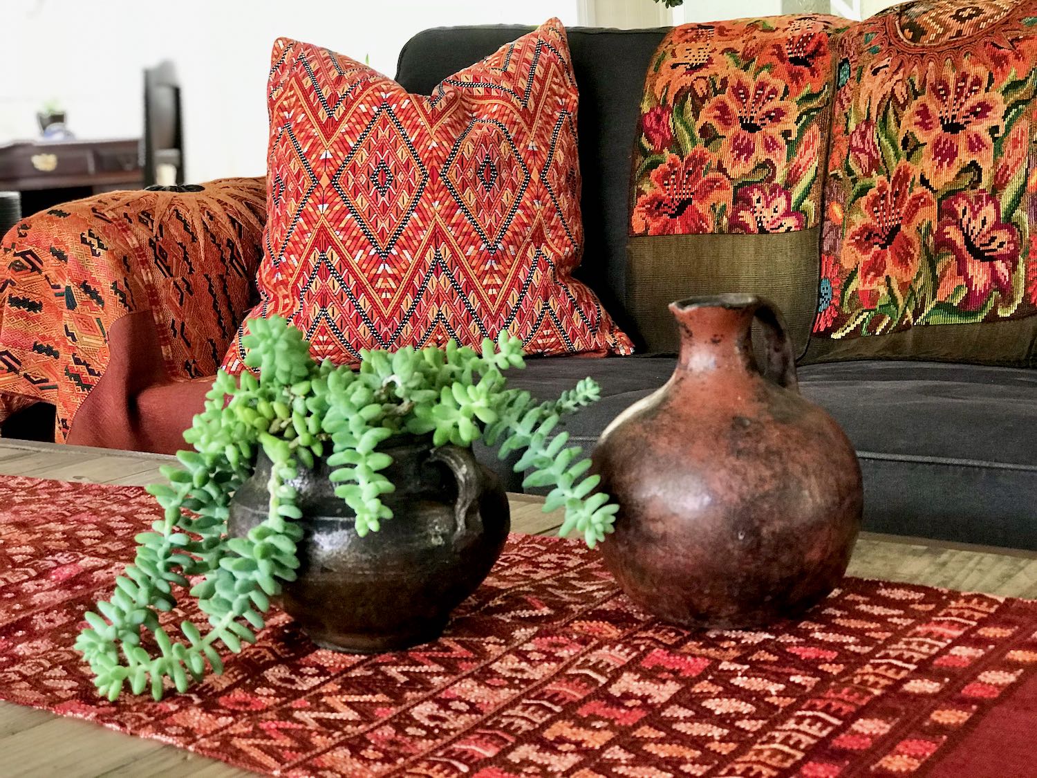 Guatemalan Textile, red table runner repurposed from a huipil from Santa Maria de Jesus