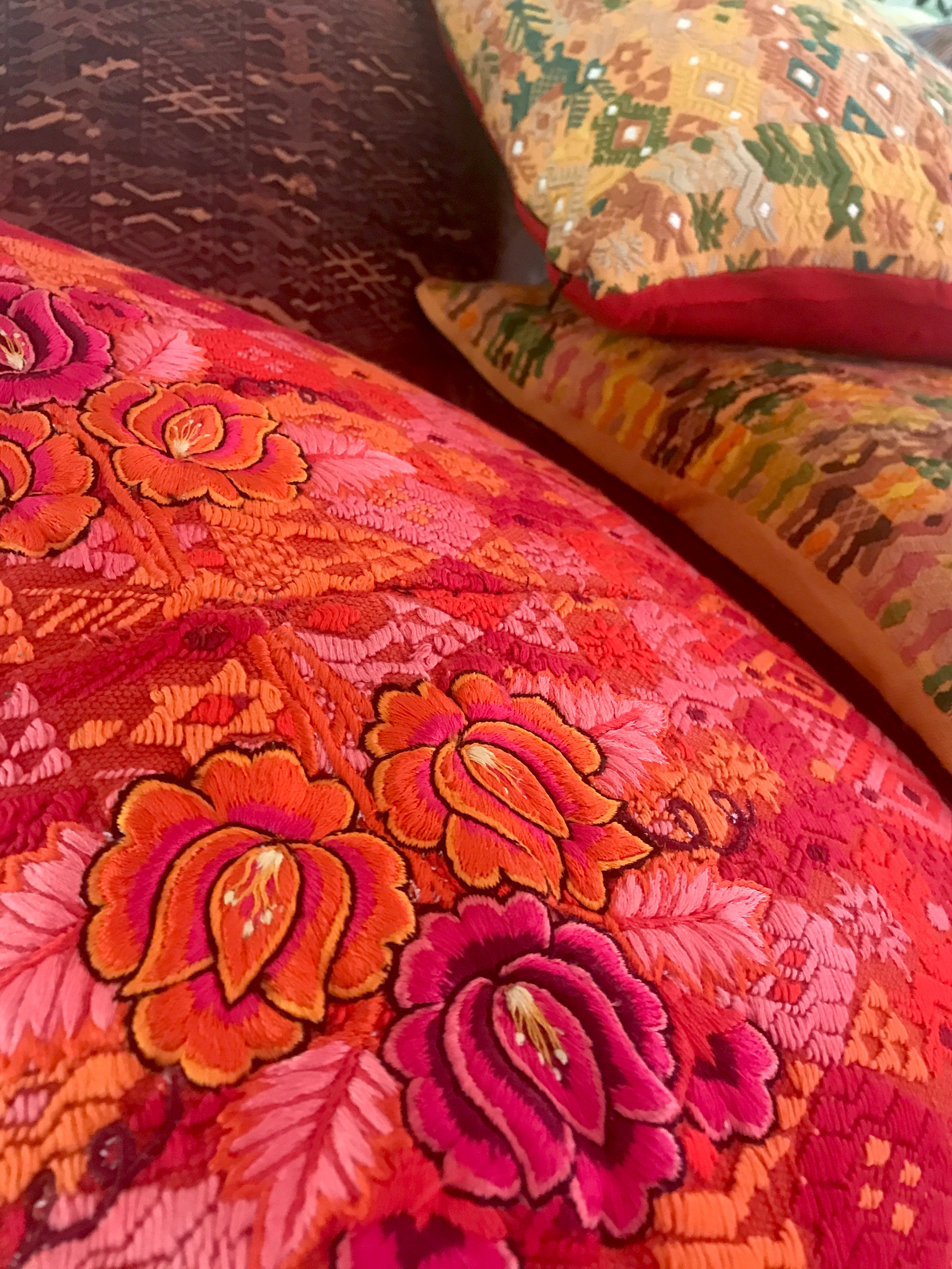 Vintage textile cushions made from a Guatemalan huipil and corte.