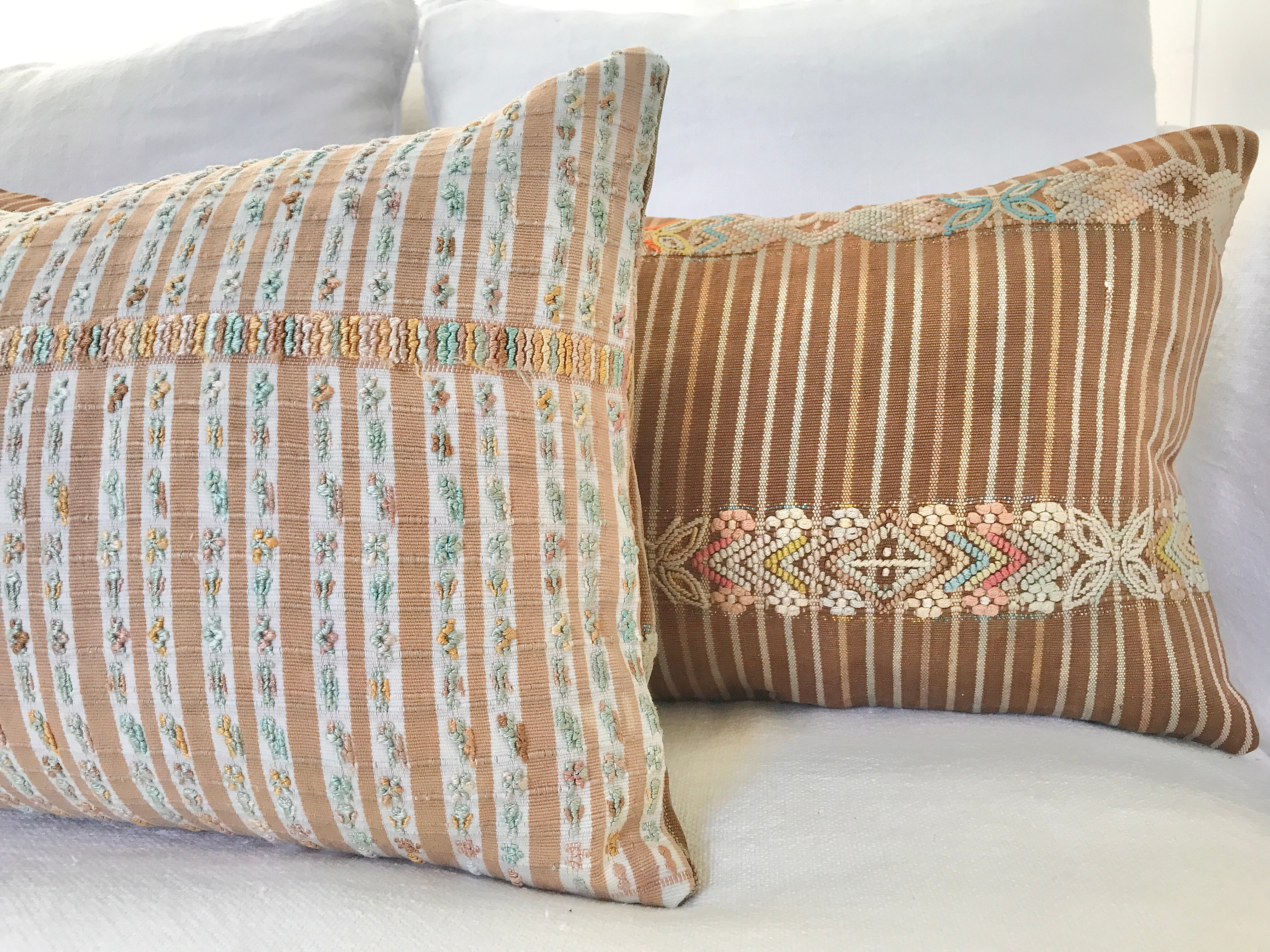 Vintage textile pillows made from a Guatemalan huipil and corte.