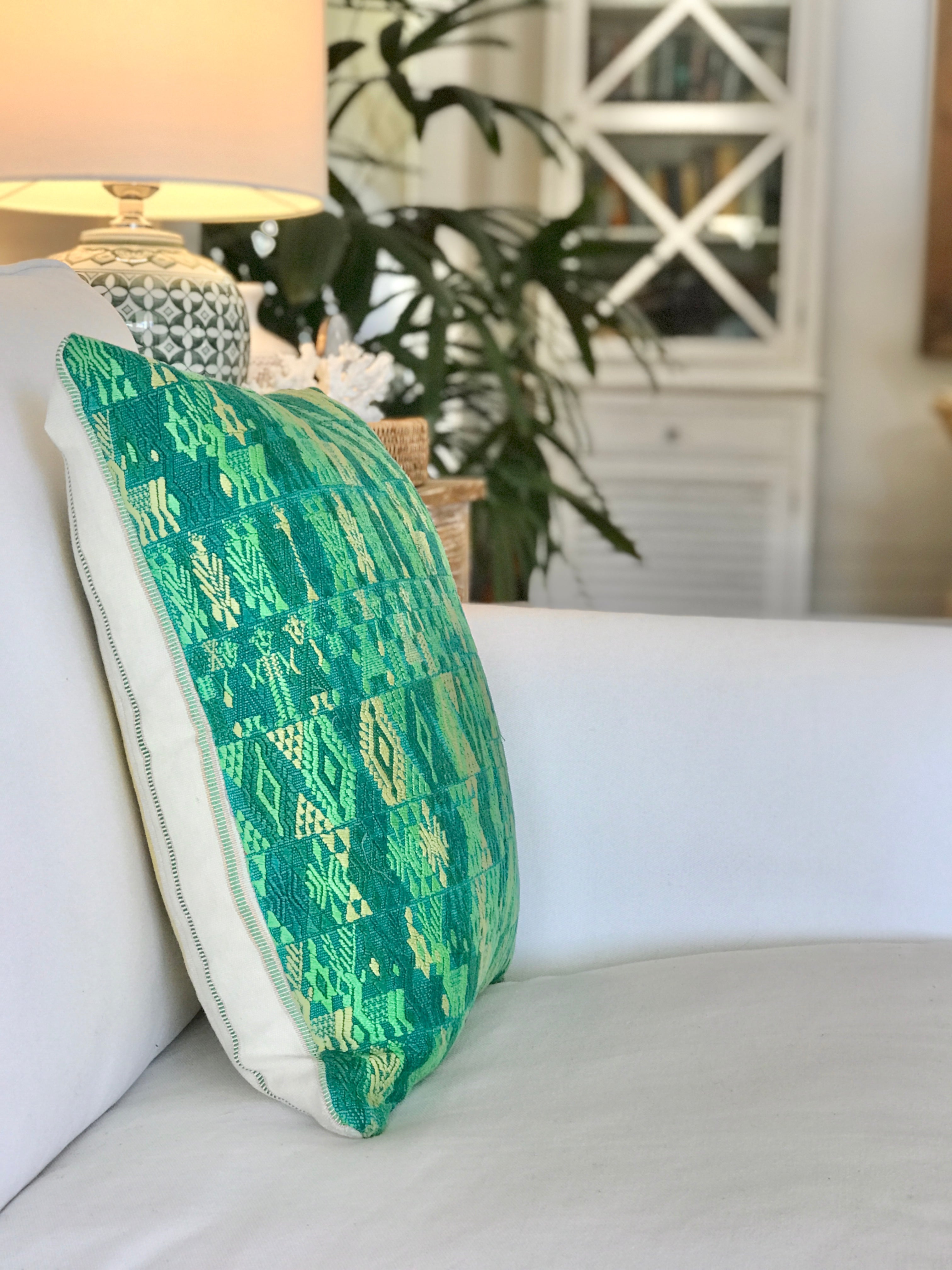 Vintage textile cushions made from a Guatemalan huipil and corte.