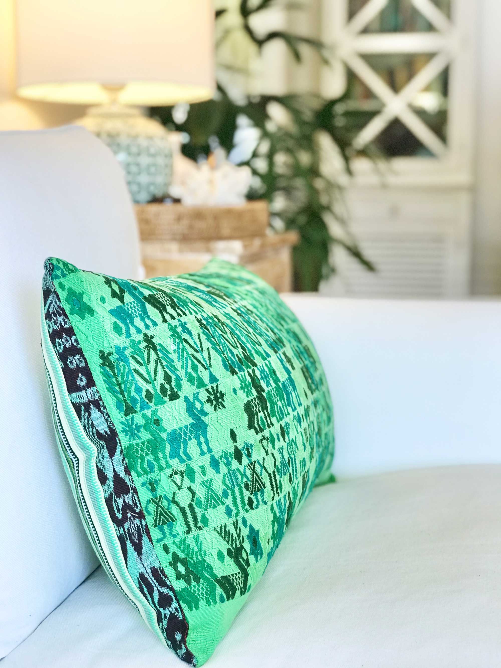 Vintage textile cushions made from a Guatemalan huipil and corte.