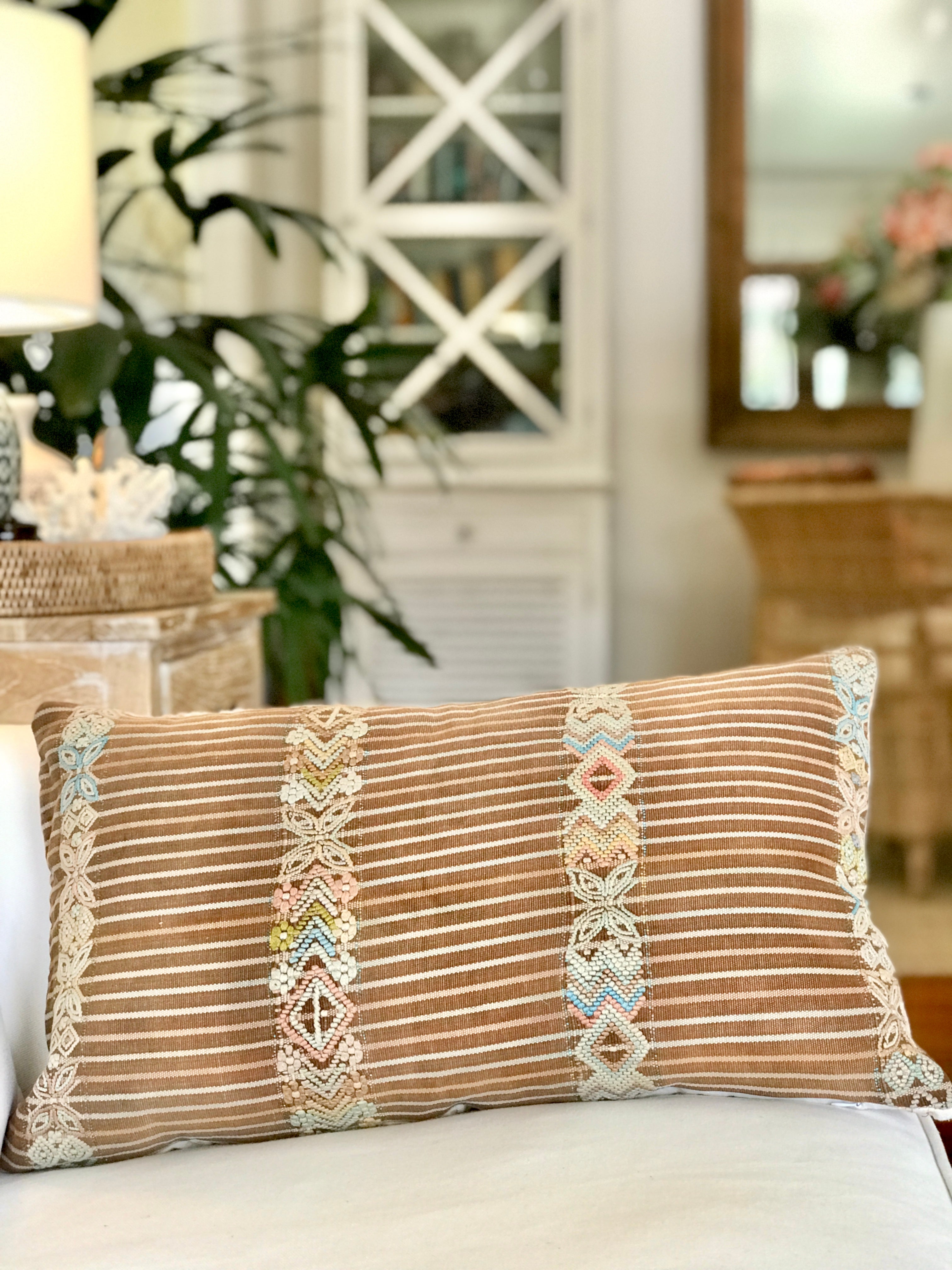Vintage textile pillows made from a Guatemalan huipil and corte.