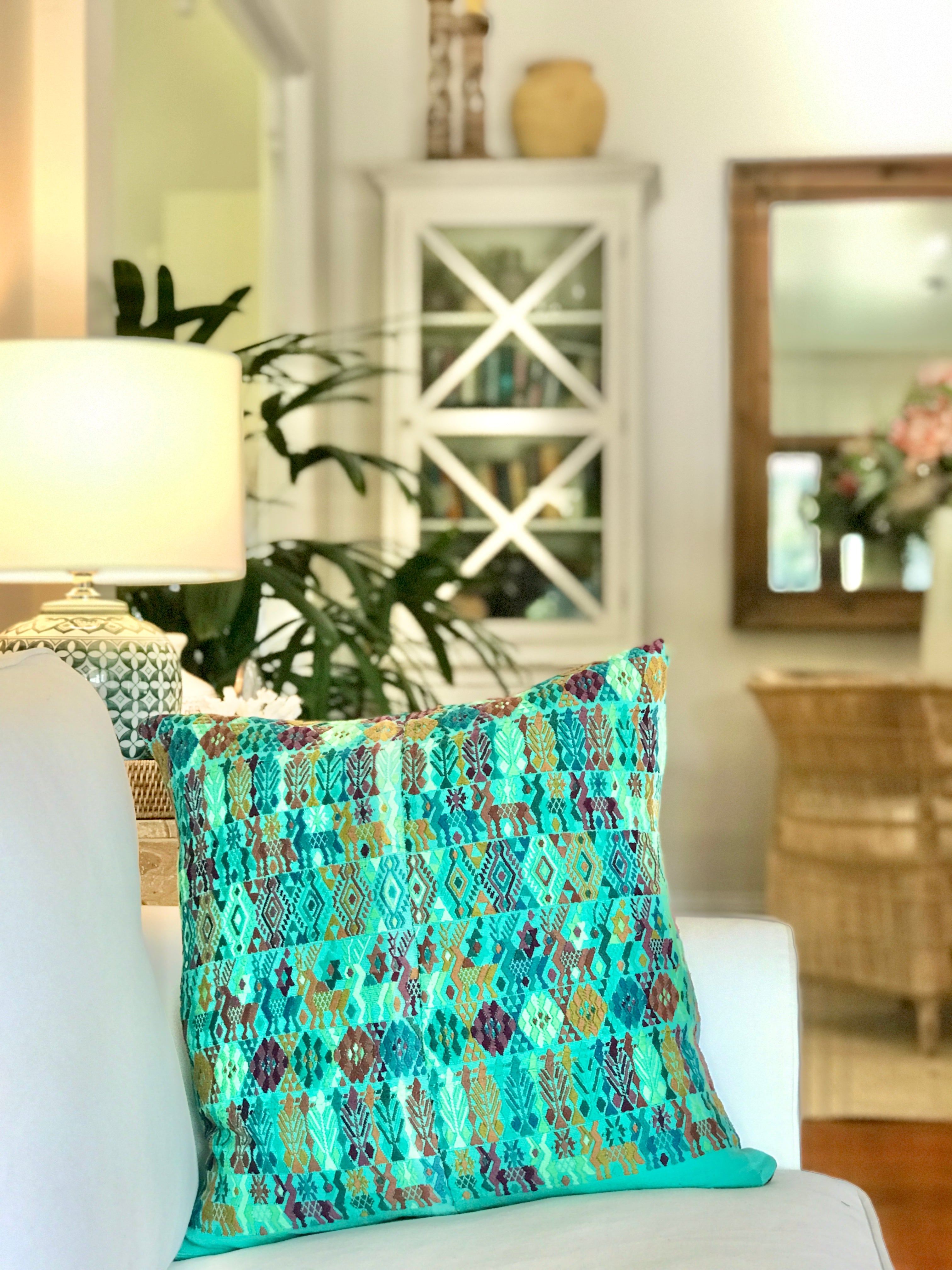 Vintage textile cushions made from a Guatemalan huipil and corte.