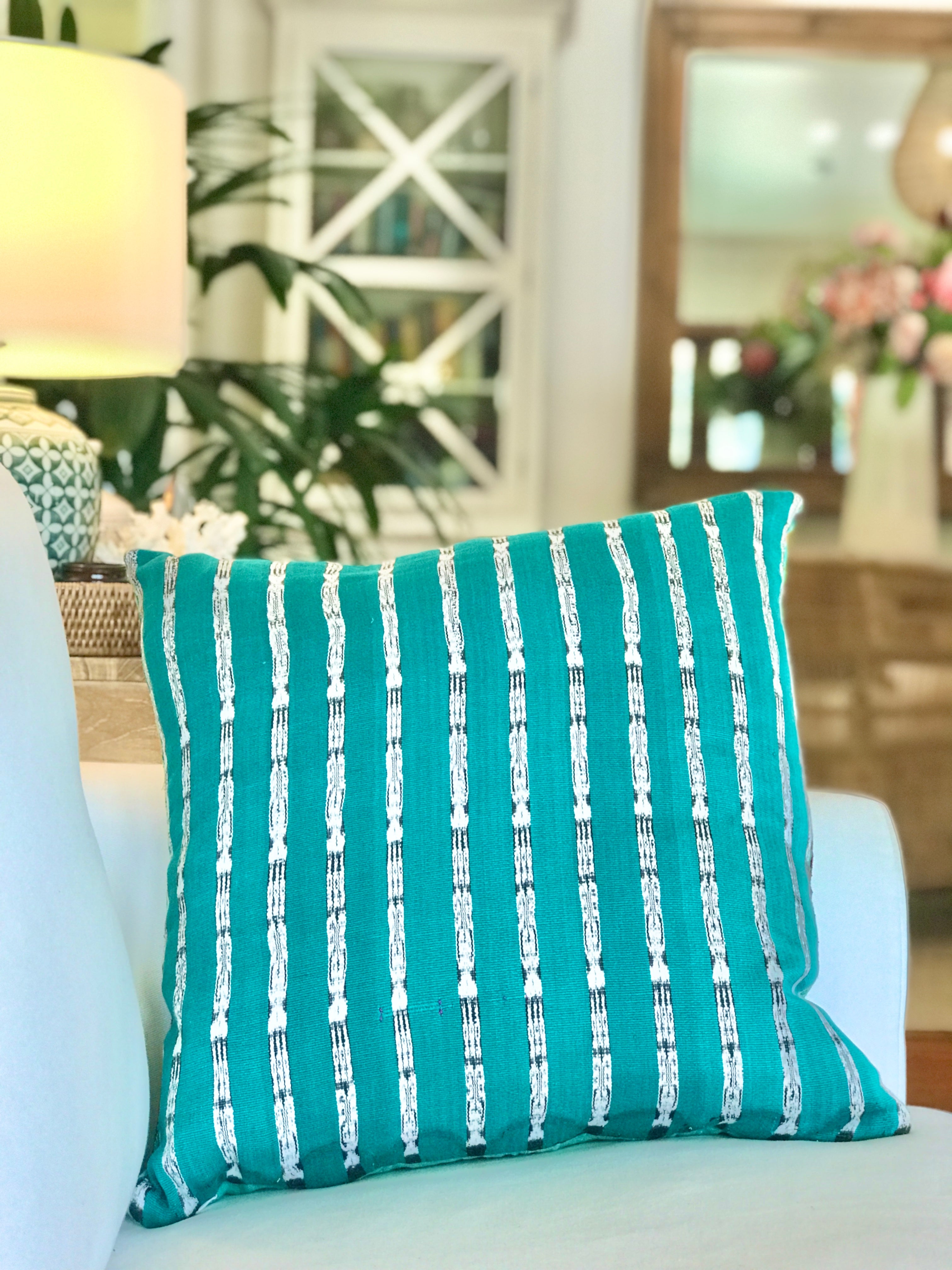 Vintage textile cushions made from a Guatemalan huipil and corte.