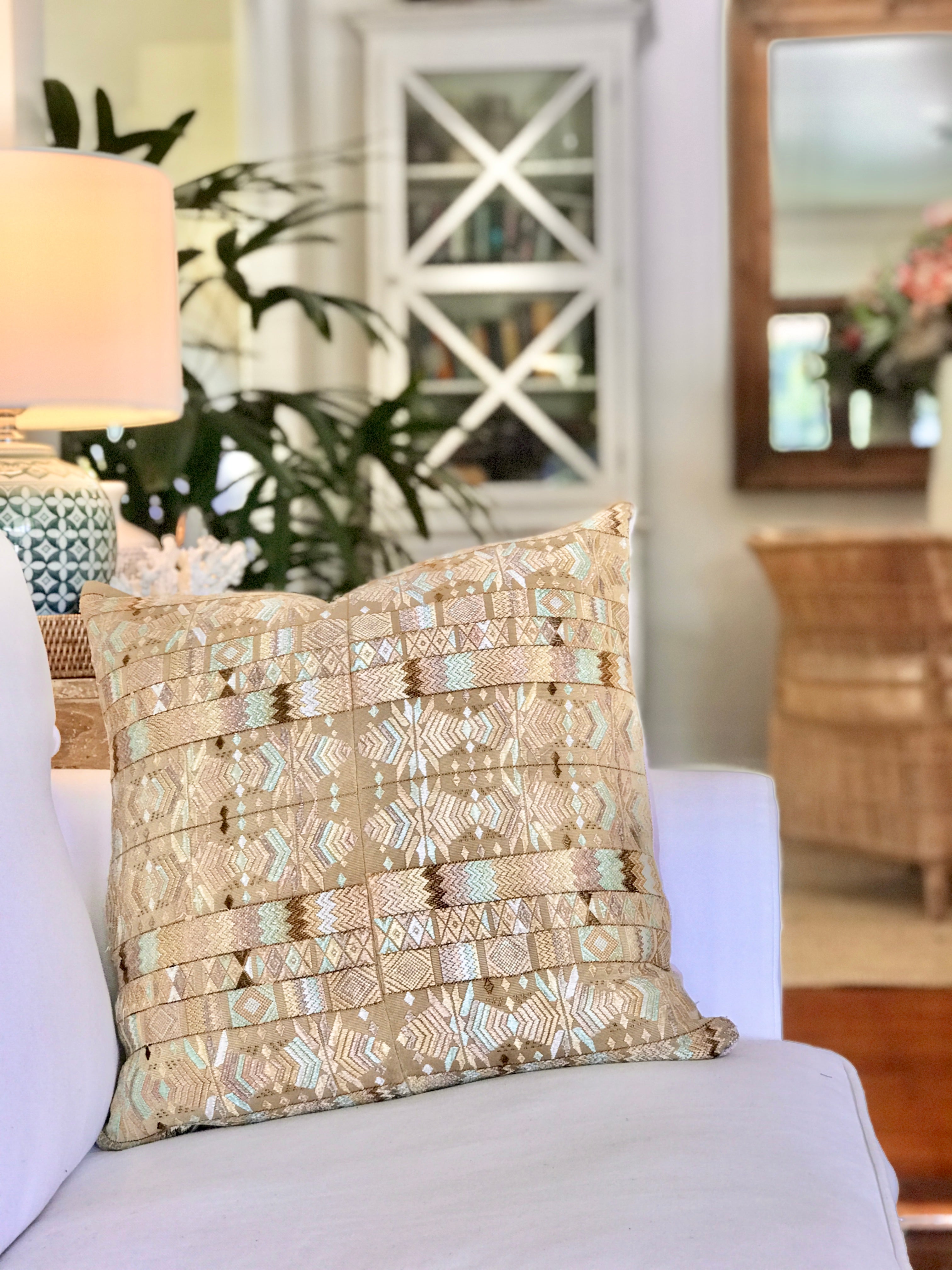 Vintage textile pillows made from a Guatemalan huipil and corte.