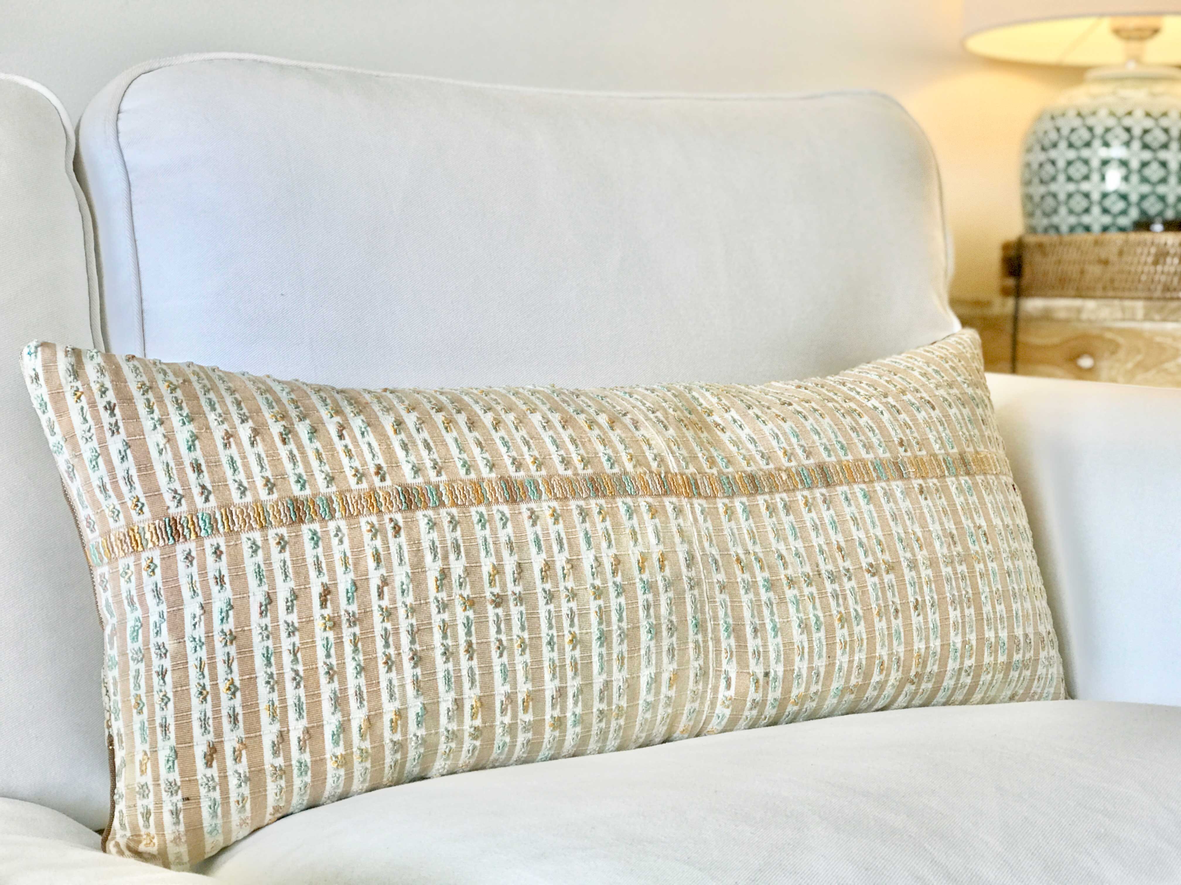 Vintage textile pillows made from a Guatemalan huipil and corte.