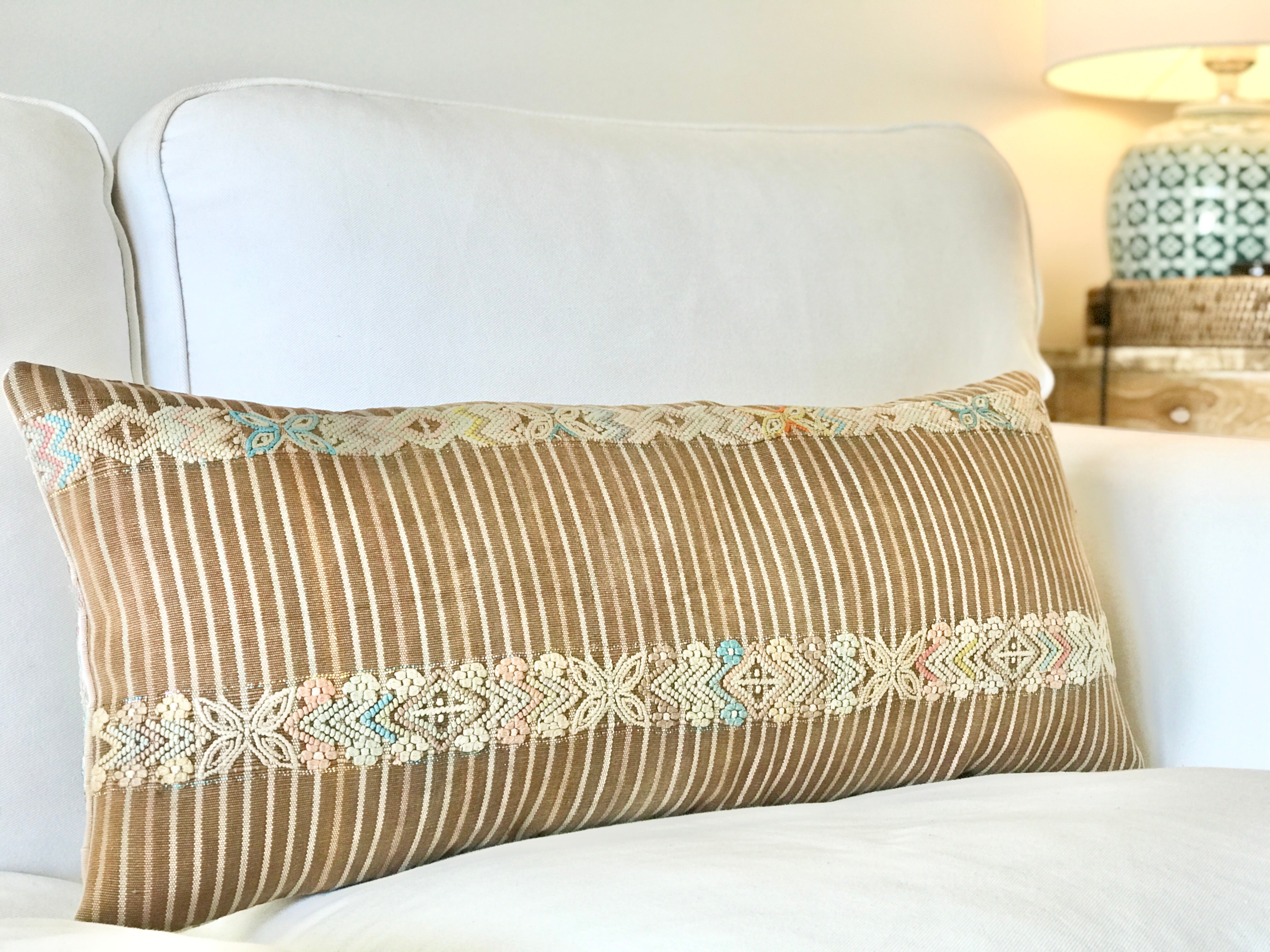 Vintage textile pillows made from a Guatemalan huipil and corte.