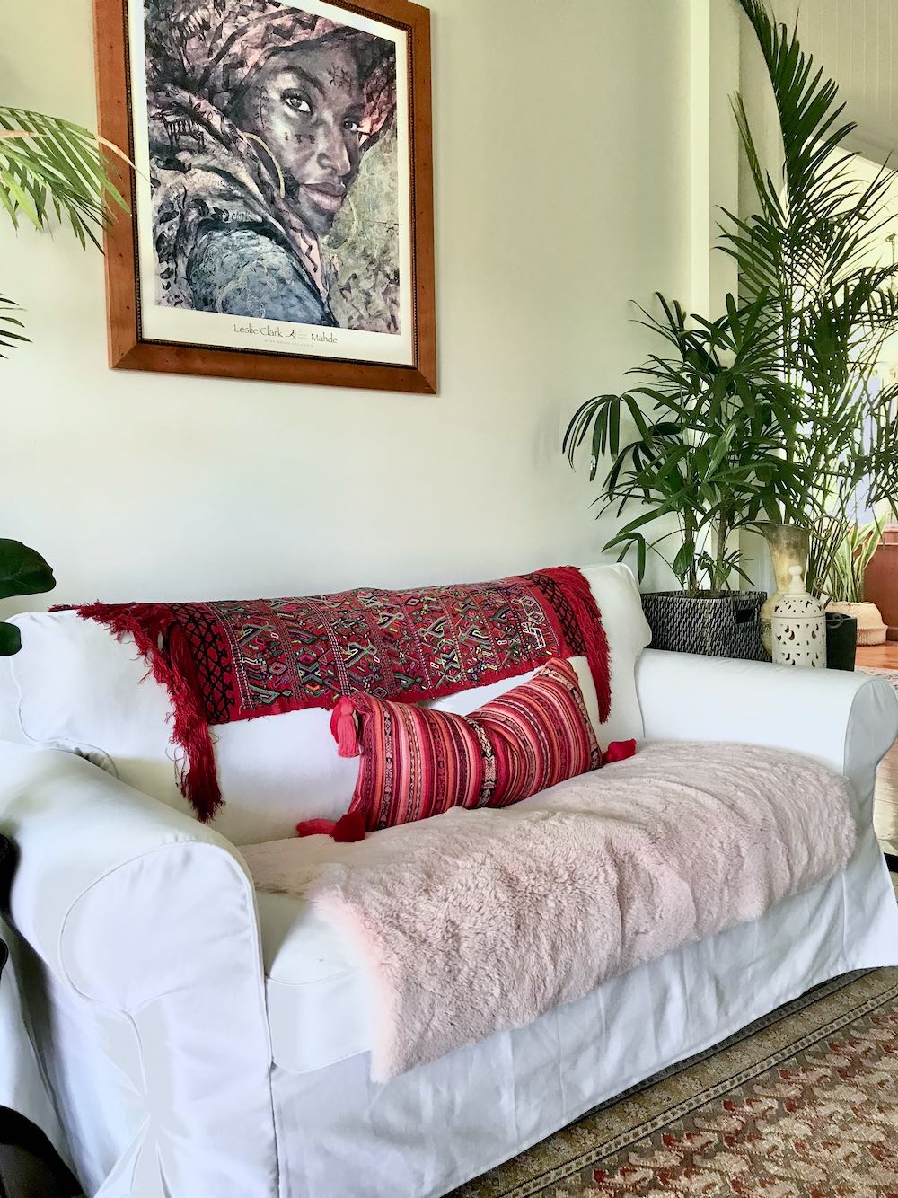 Guatemalan Corte Pillow, hand woven pink and coral striped ikat lumbar cushion with tassels