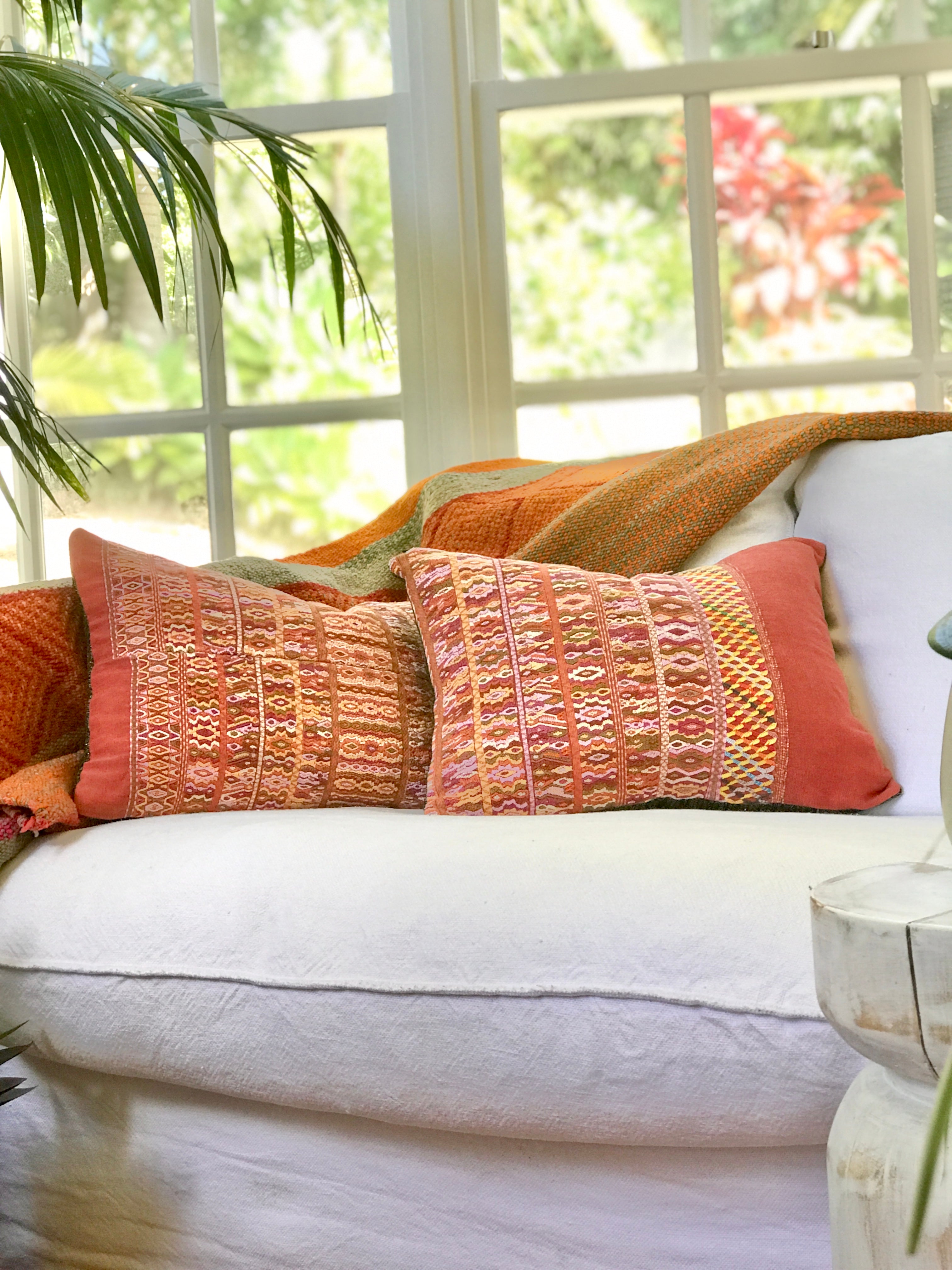 Vintage textile pillows made from a Guatemalan huipil and corte.