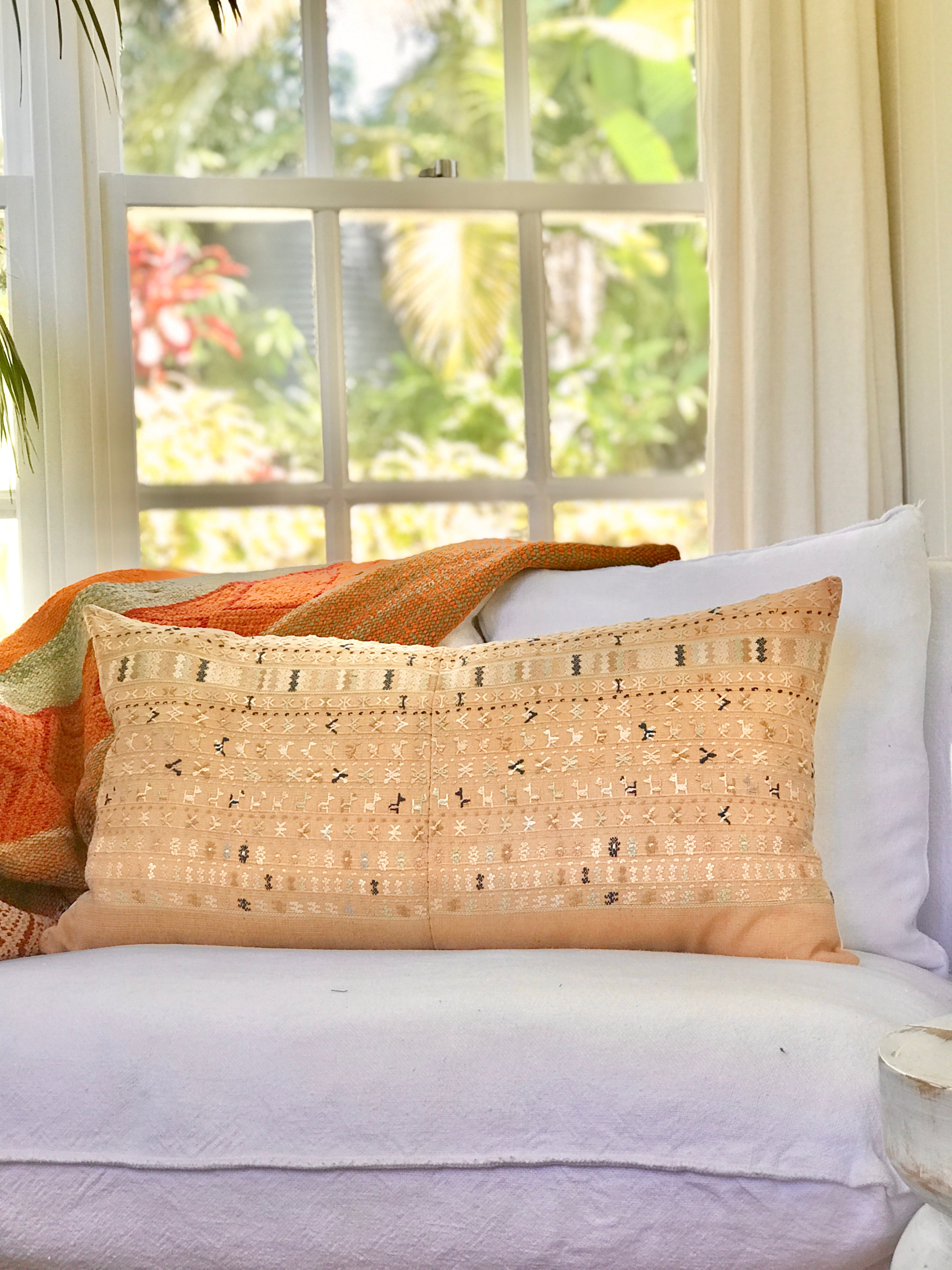 Vintage textile pillows made from a Guatemalan huipil and corte.