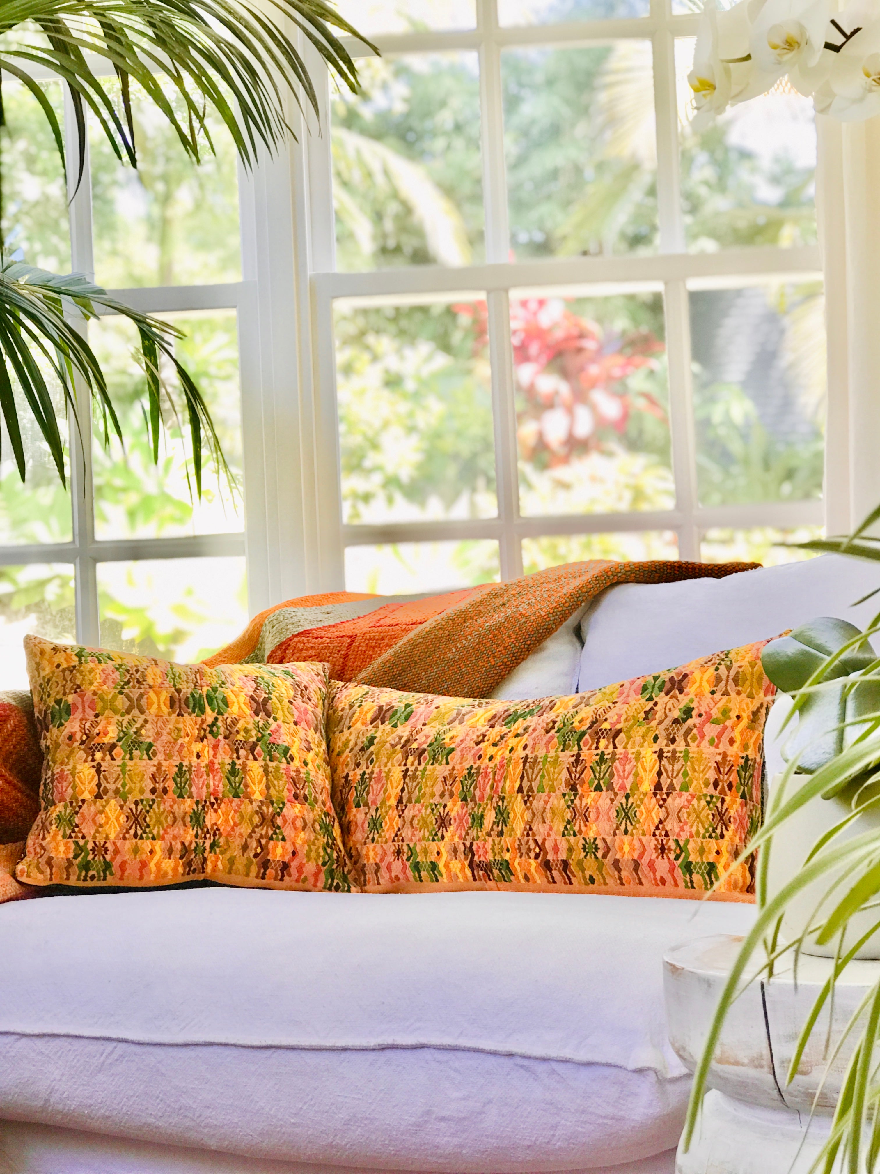 Vintage textile cushions made from a Guatemalan huipil and corte.